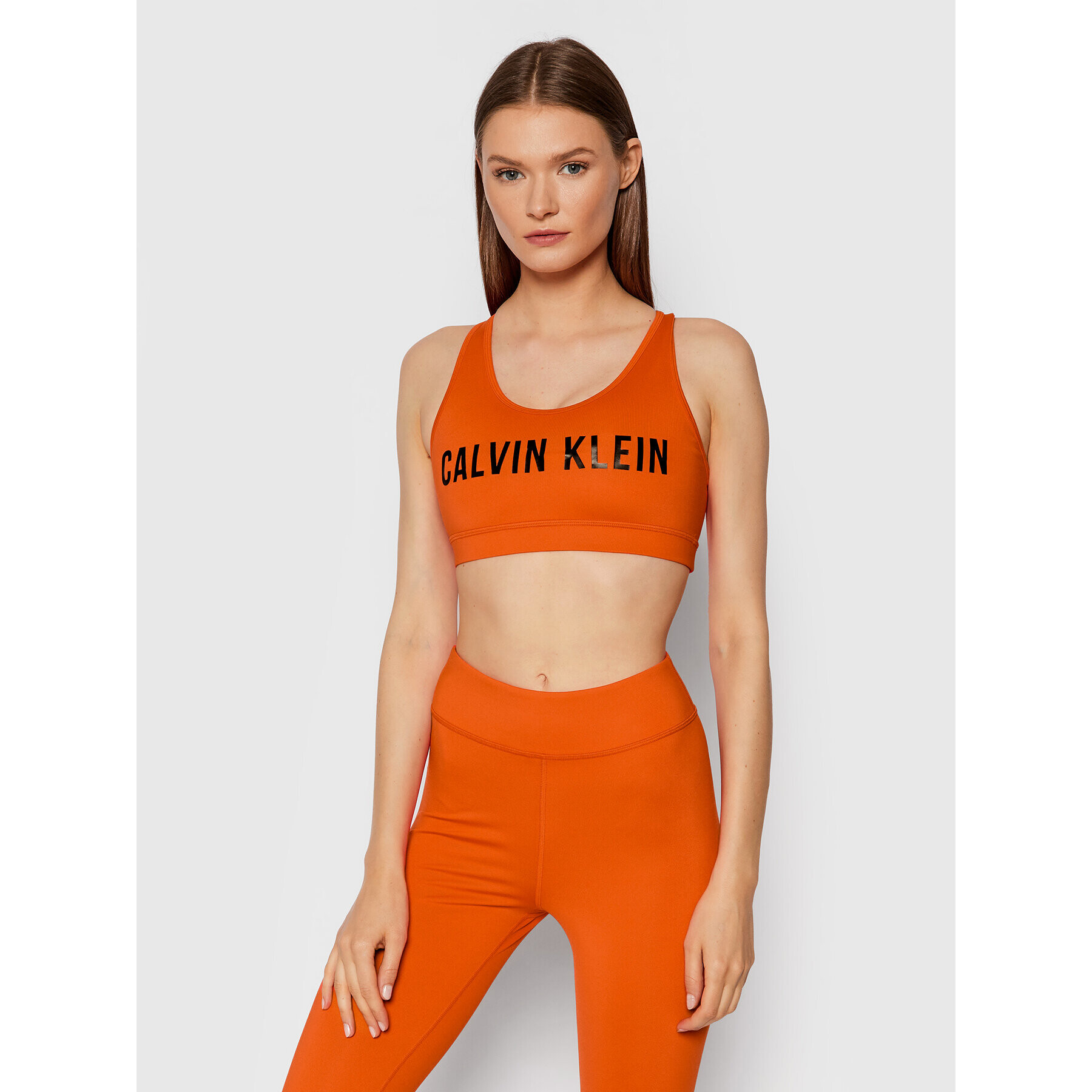 Calvin Klein Performance Спортен сутиен Medium Support 00GWF0K157 Оранжев - Pepit.bg