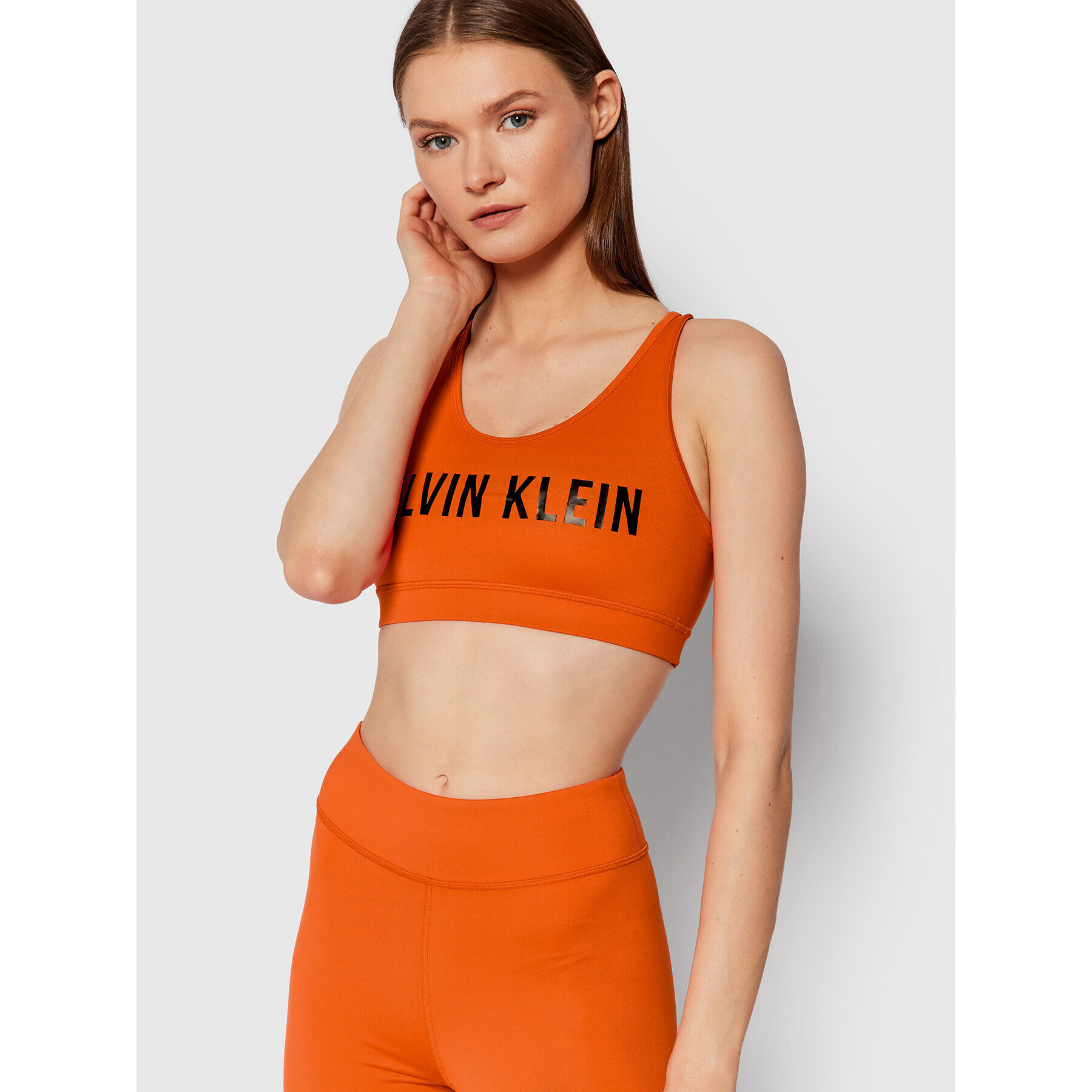 Calvin Klein Performance Спортен сутиен Medium Support 00GWF0K157 Оранжев - Pepit.bg