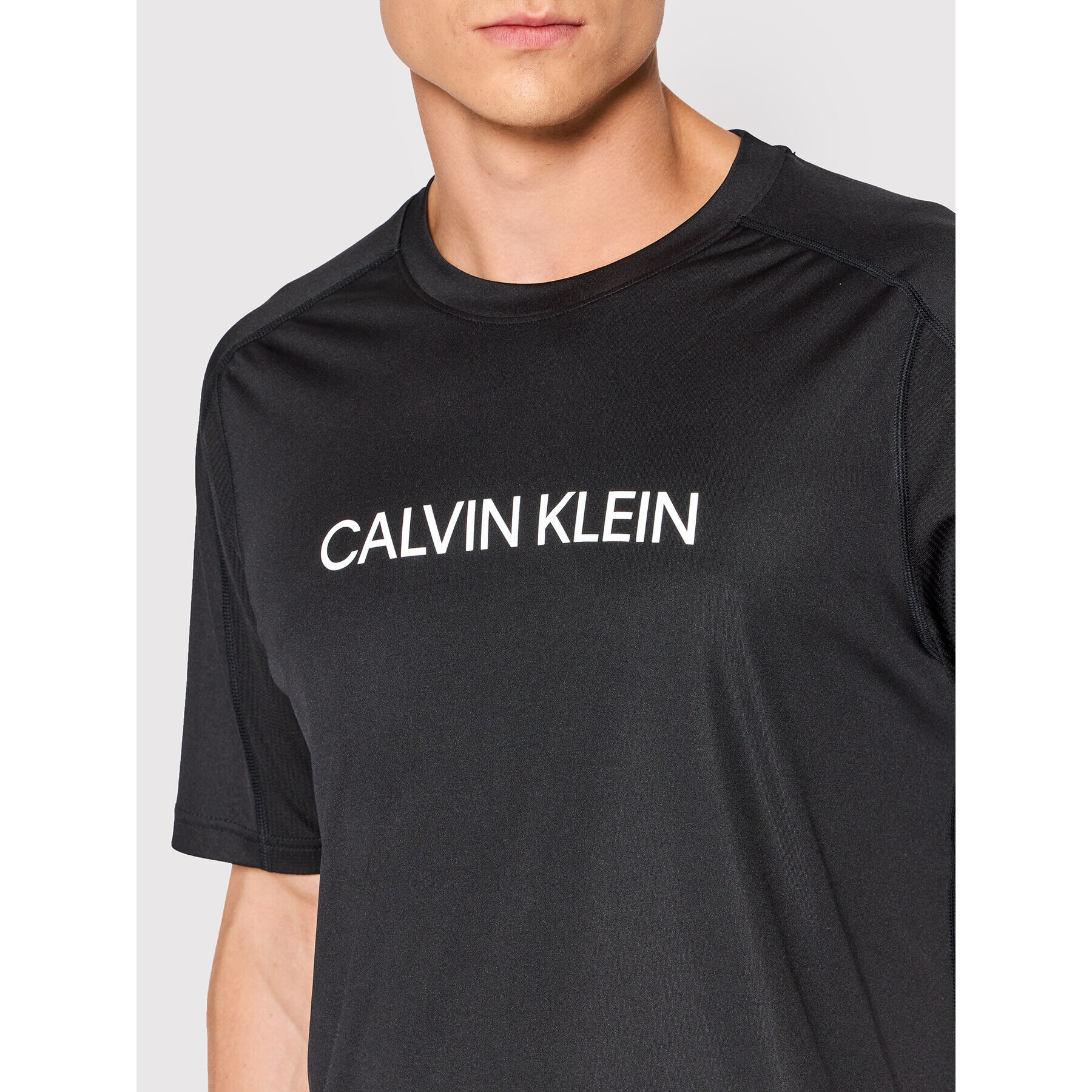 Calvin Klein Performance Тениска от техническо трико 00GMF1K109 Черен Regular Fit - Pepit.bg