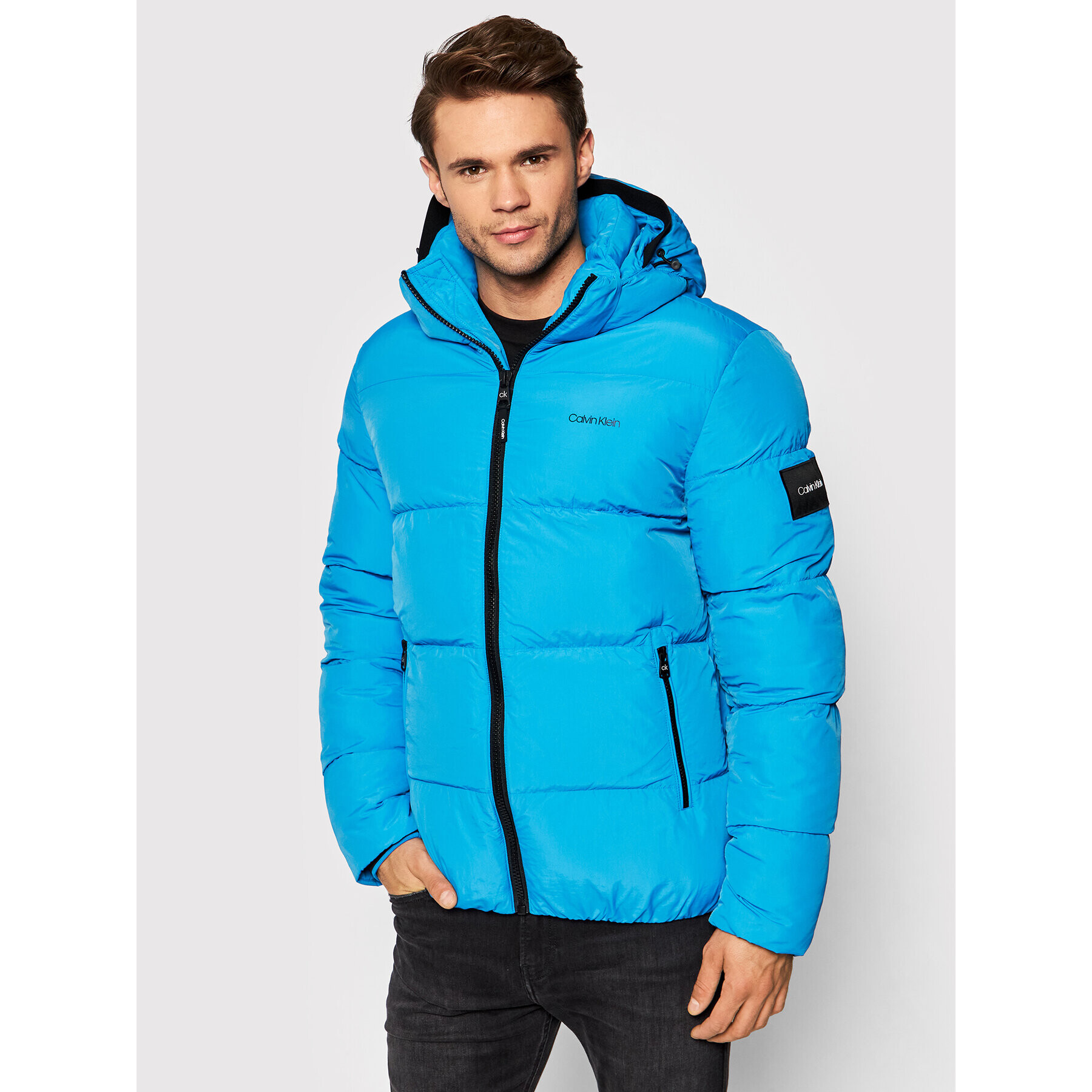 Calvin Klein Пухено яке Crinkle K10K107485 Син Regular Fit - Pepit.bg