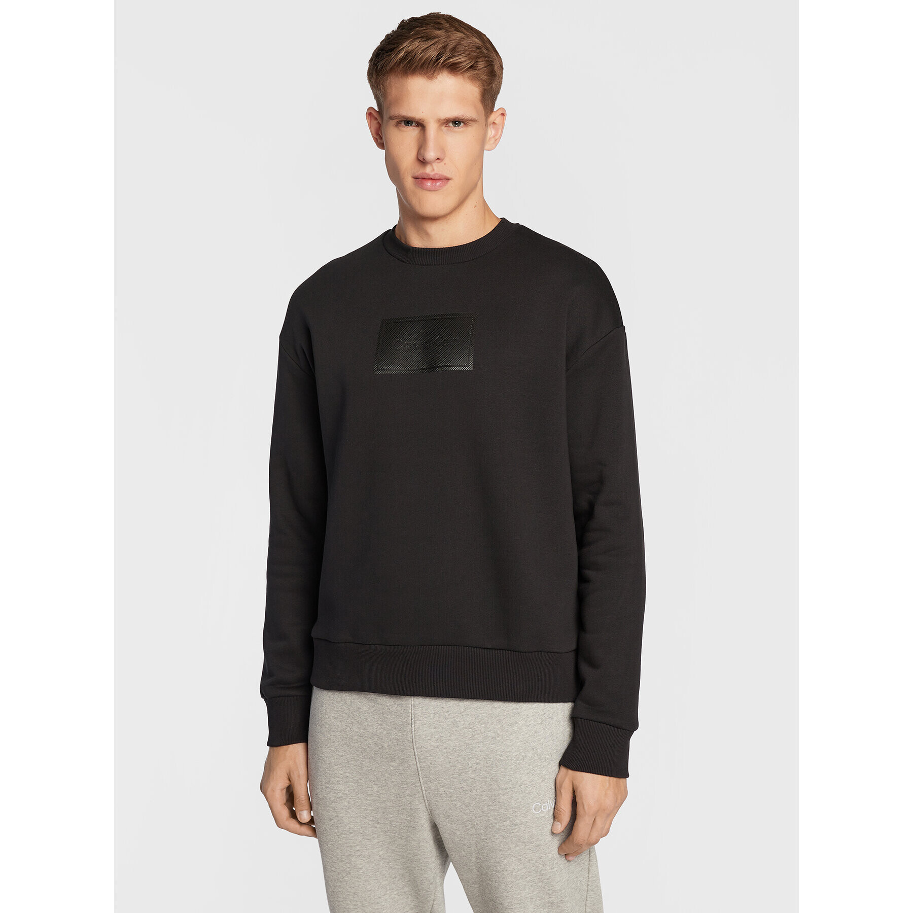 Calvin Klein Суитшърт Textured Logo K10K110083 Черен Relaxed Fit - Pepit.bg