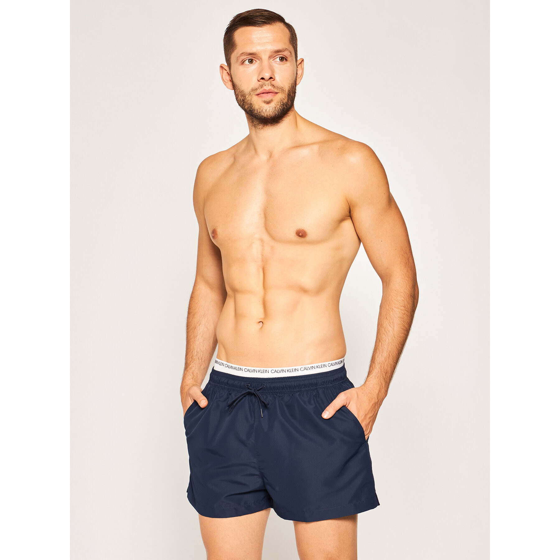 Calvin Klein Swimwear Плувни шорти Double WB KM0KM00438 Тъмносин Regular Fit - Pepit.bg