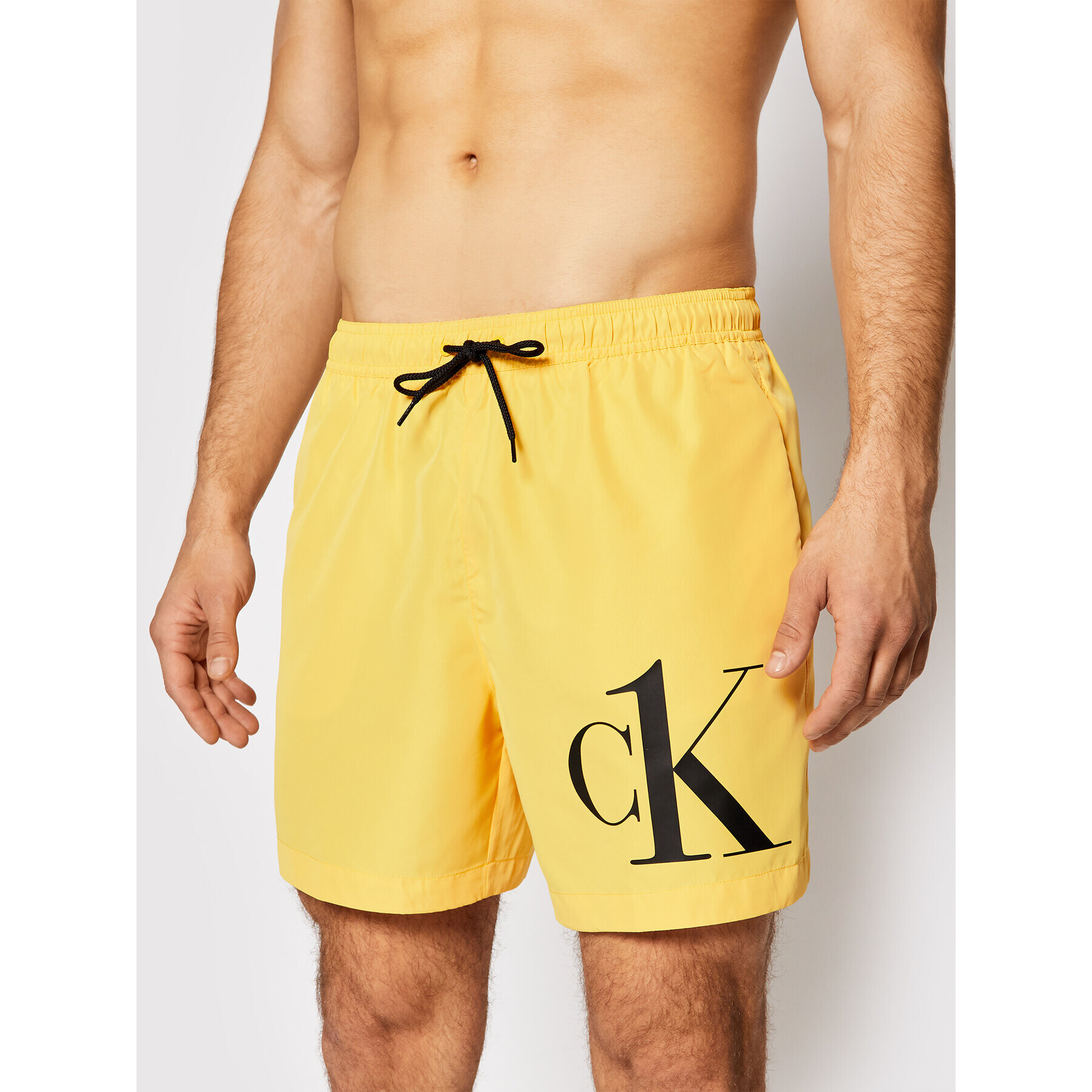 Calvin Klein Swimwear Плувни шорти Drawstring KM0KM00590 Жълт Regular Fit - Pepit.bg