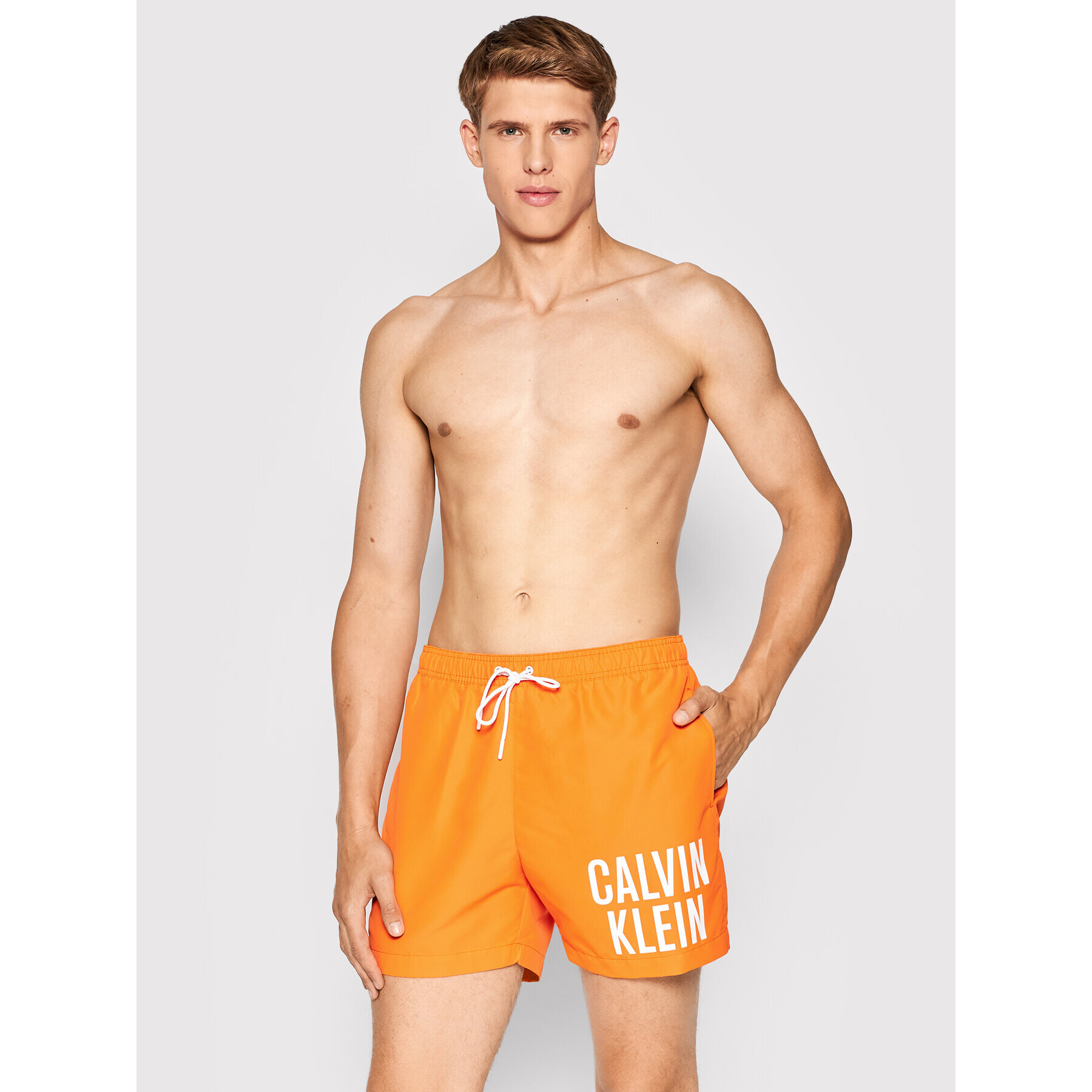 Calvin Klein Swimwear Плувни шорти Intense Power KM0KM00701 Оранжев Regular Fit - Pepit.bg