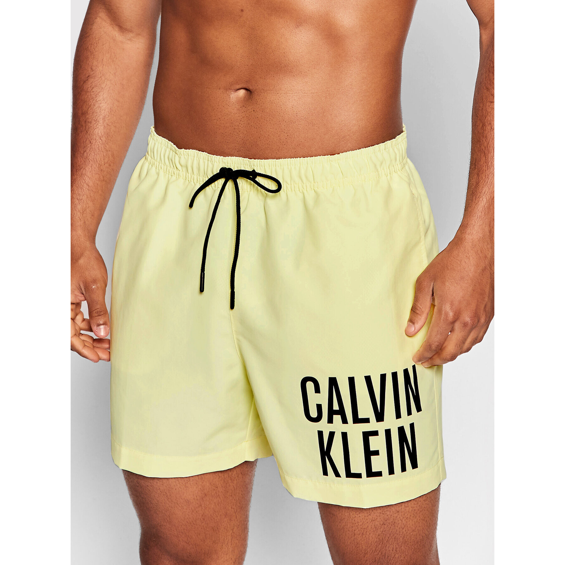 Calvin Klein Swimwear Плувни шорти Intense Power KM0KM00701 Жълт Regular Fit - Pepit.bg