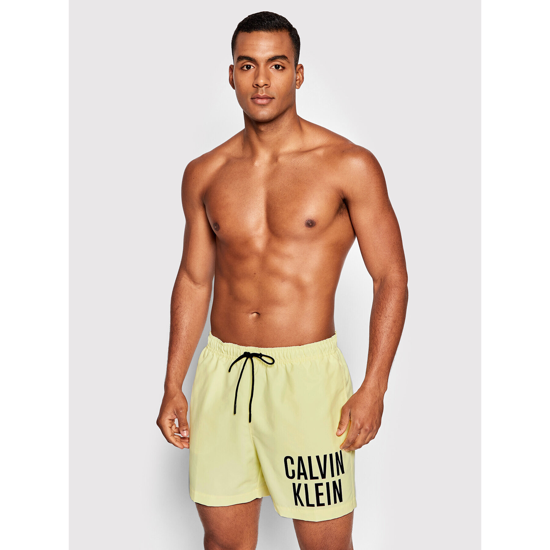 Calvin Klein Swimwear Плувни шорти Intense Power KM0KM00701 Жълт Regular Fit - Pepit.bg