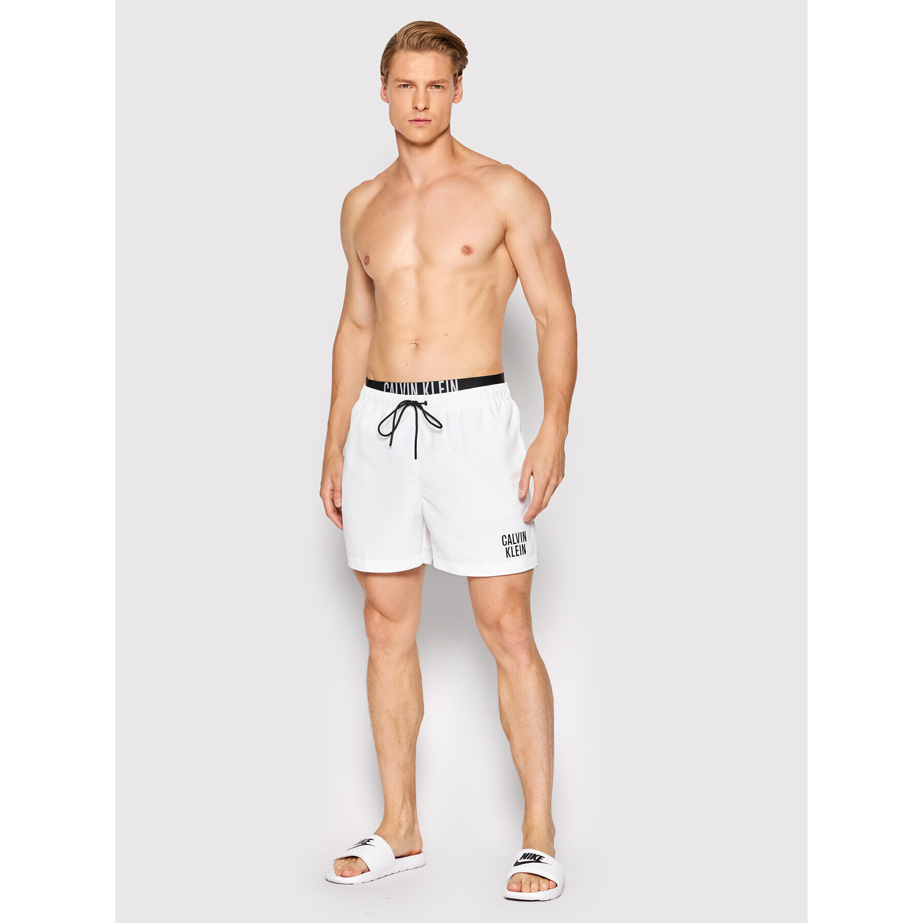 Calvin Klein Swimwear Плувни шорти Intense Power KM0KM00702 Бял Regular Fit - Pepit.bg