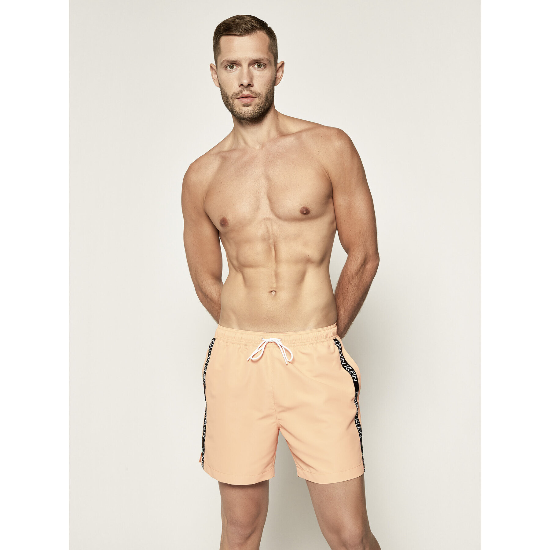 Calvin Klein Swimwear Плувни шорти KM0KM00434 Оранжев Regular Fit - Pepit.bg