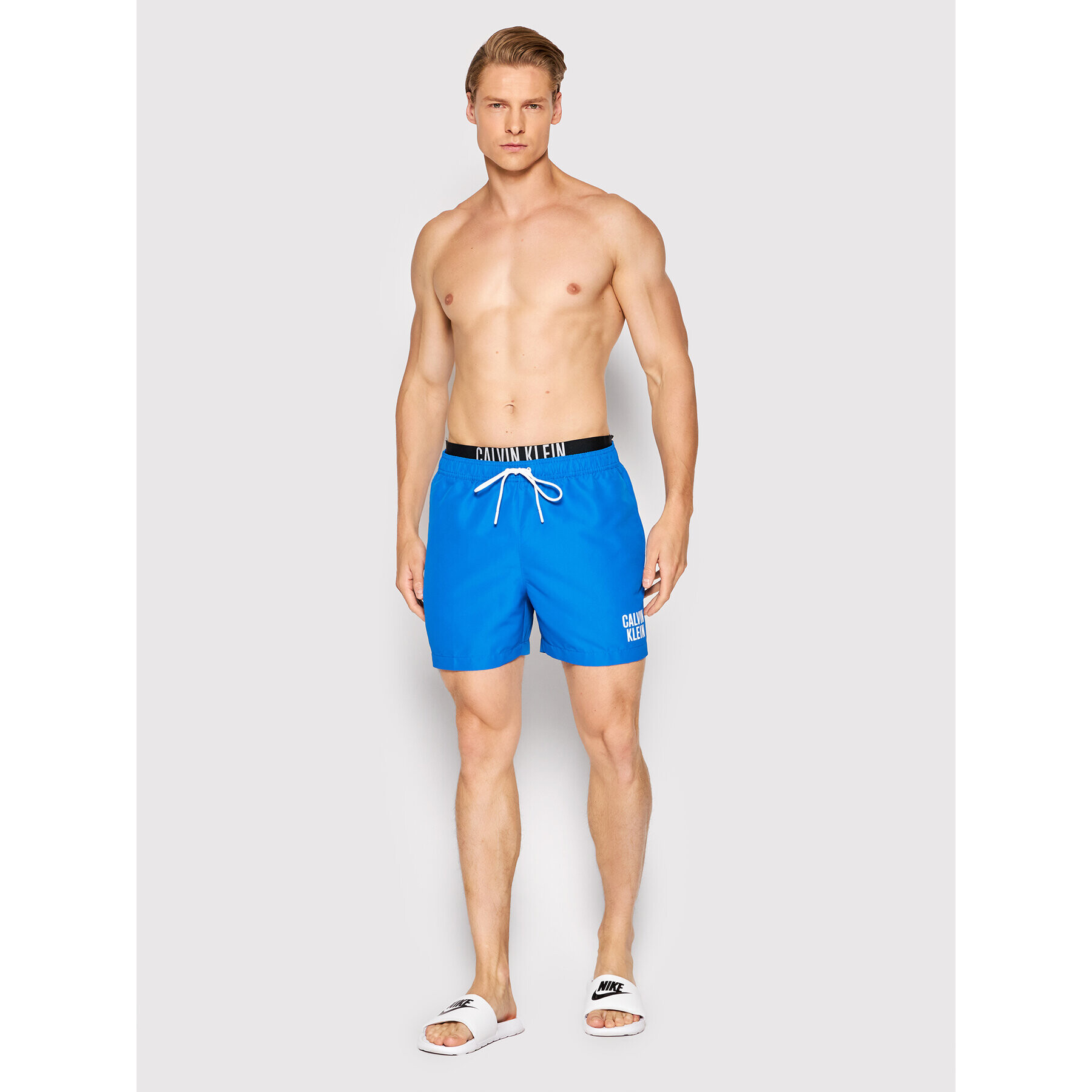 Calvin Klein Swimwear Плувни шорти KM0KM00702 Син Regular Fit - Pepit.bg