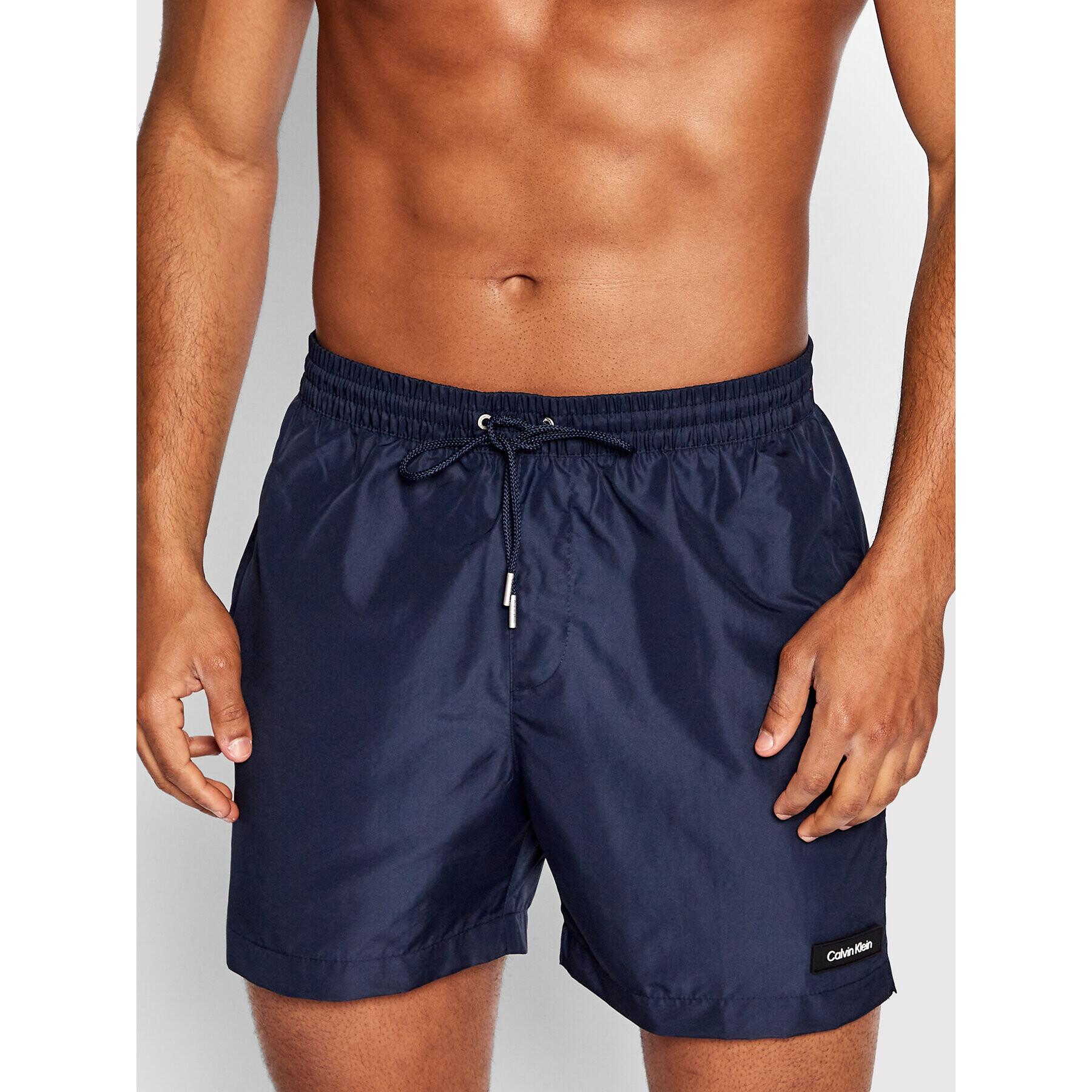 Calvin Klein Swimwear Плувни шорти KM0KM00721 Тъмносин Regular Fit - Pepit.bg