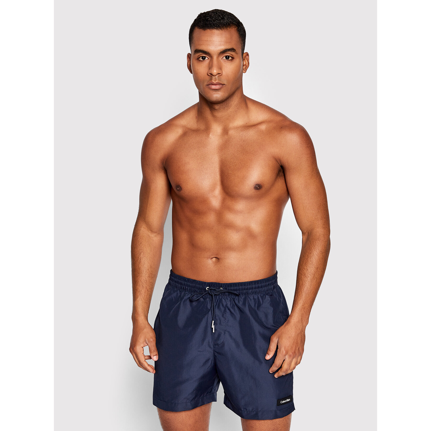 Calvin Klein Swimwear Плувни шорти KM0KM00721 Тъмносин Regular Fit - Pepit.bg