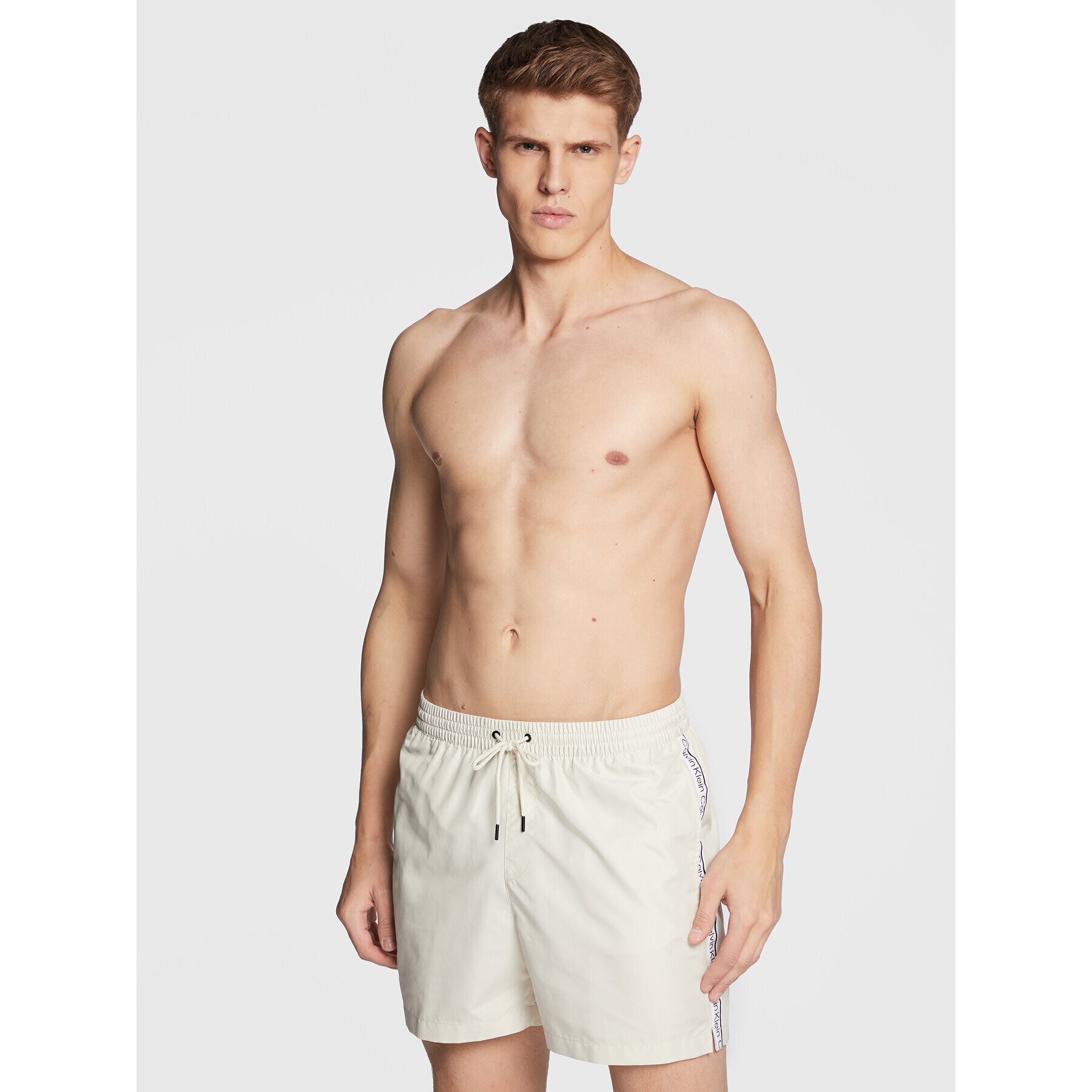 Calvin Klein Swimwear Плувни шорти KM0KM00789 Екрю Regular Fit - Pepit.bg