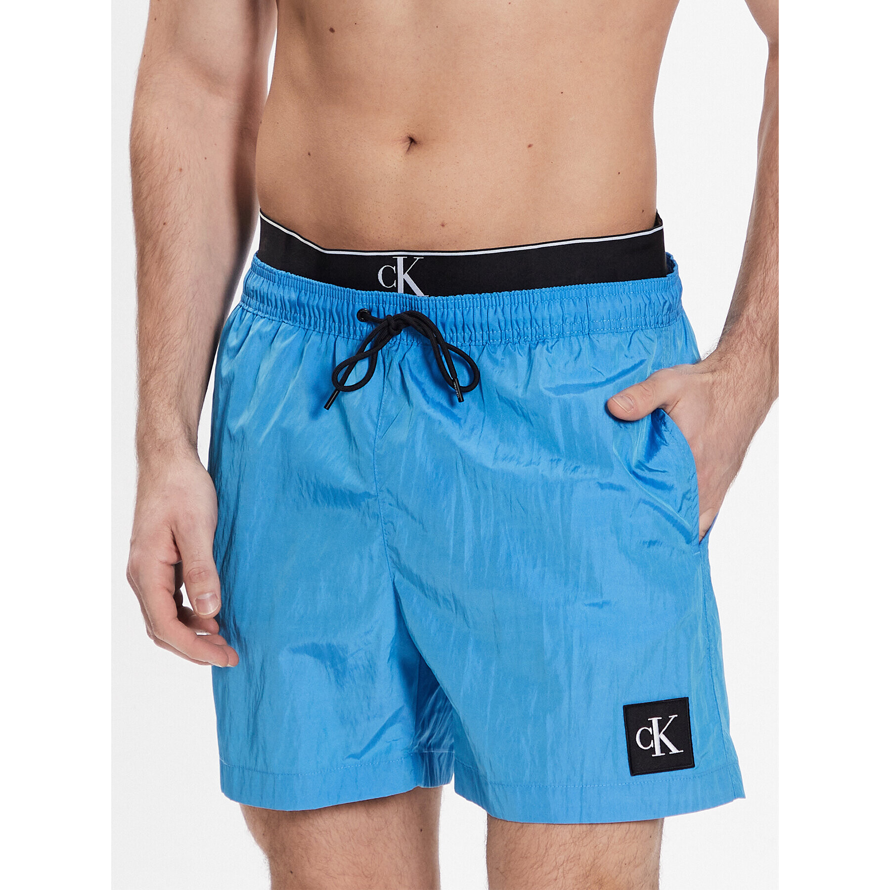 Calvin Klein Swimwear Плувни шорти Medium Double Wb KM0KM00846 Син Regular Fit - Pepit.bg