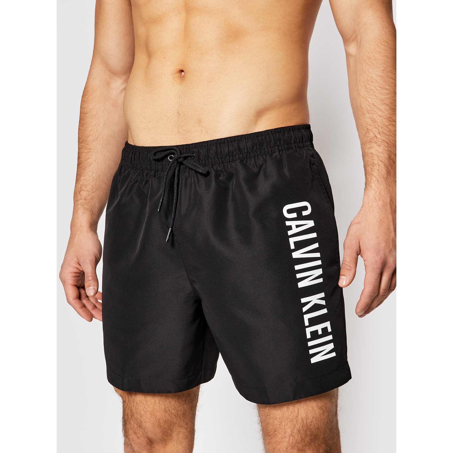 Calvin Klein Swimwear Плувни шорти Medium Drawstring KM0KM00570 Черен Regular Fit - Pepit.bg