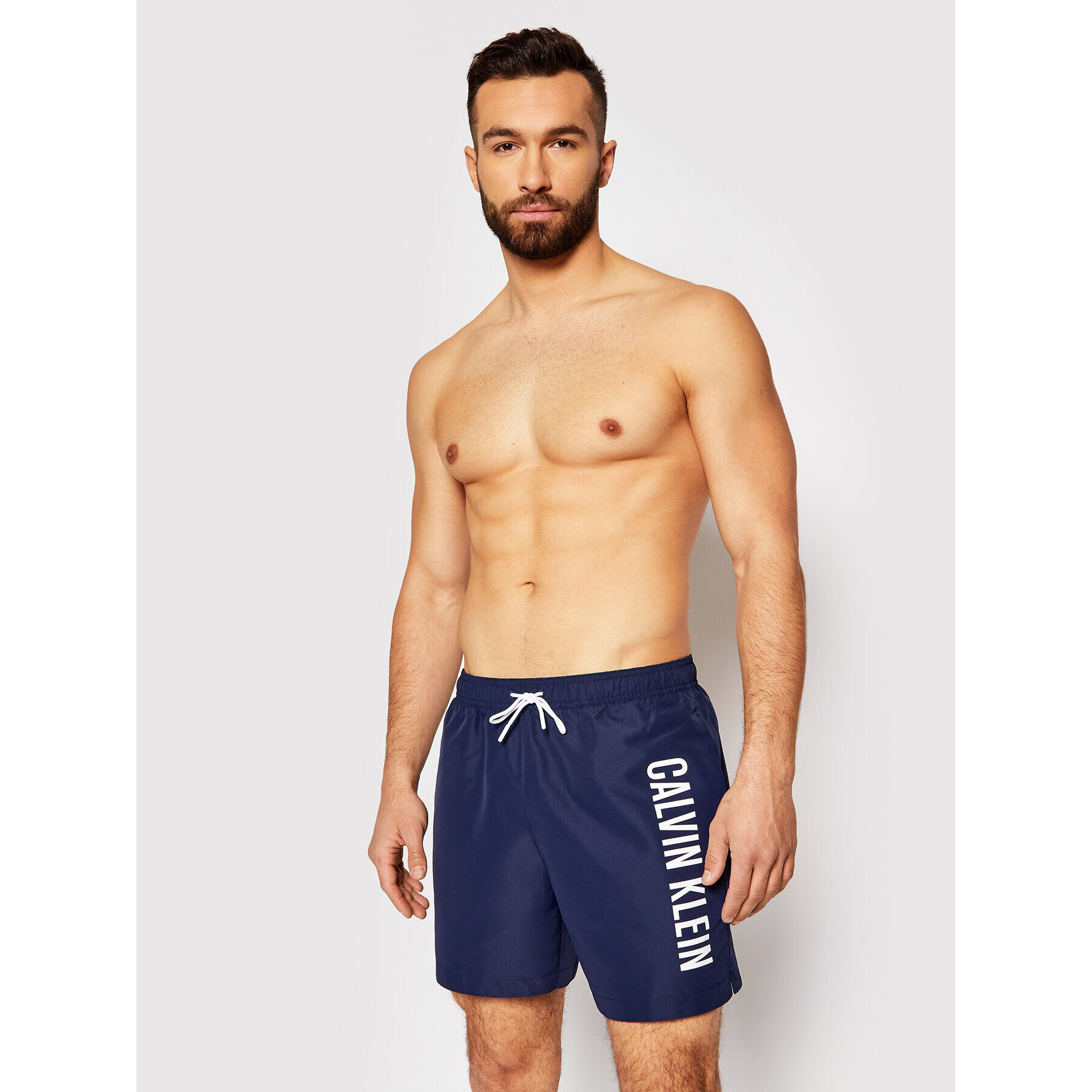 Calvin Klein Swimwear Плувни шорти Medium Drawstring KM0KM00570 Тъмносин Regular Fit - Pepit.bg