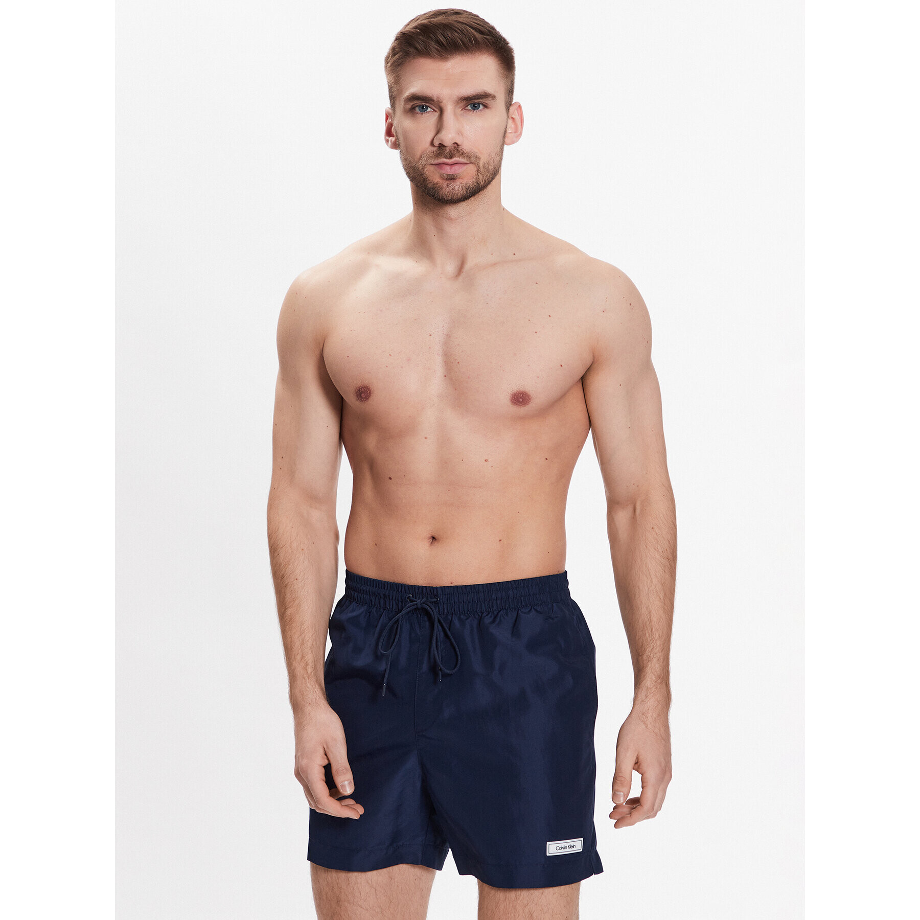 Calvin Klein Swimwear Плувни шорти Medium Drawstring KM0KM00812 Тъмносин Regular Fit - Pepit.bg