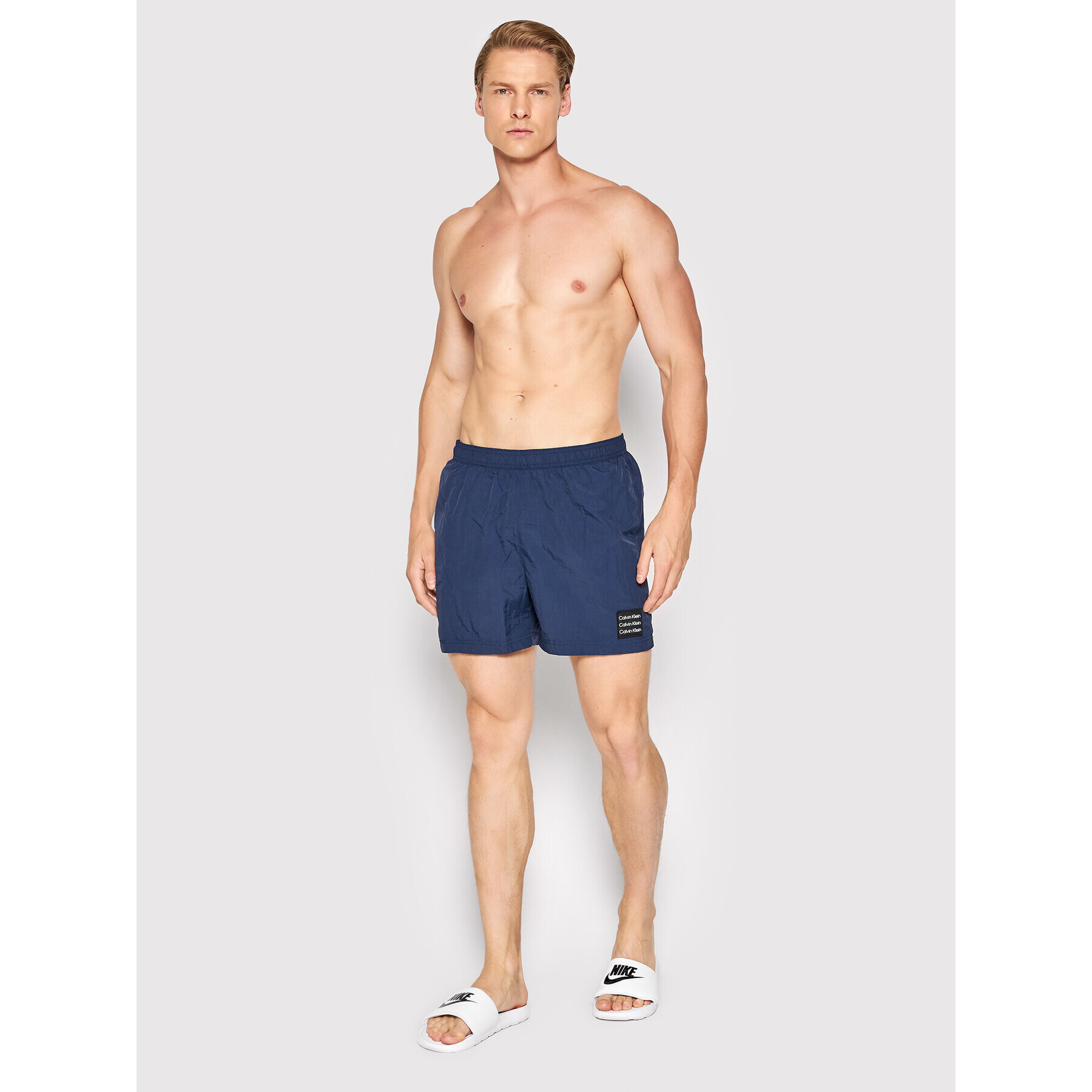 Calvin Klein Swimwear Плувни шорти Medium KM0KM00712 Тъмносин Regular Fit - Pepit.bg