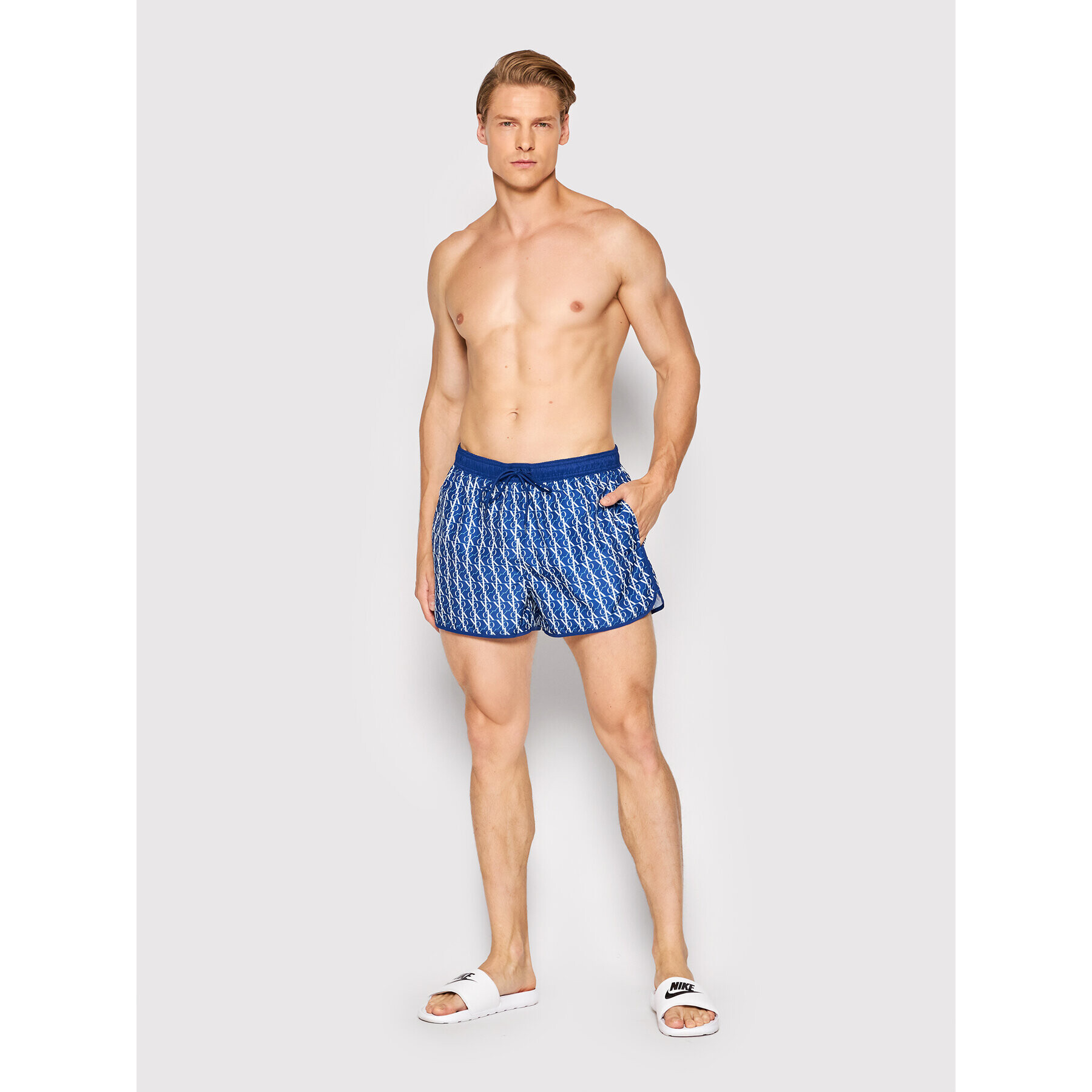 Calvin Klein Swimwear Плувни шорти Runner KM0KM00738 Син Regular Fit - Pepit.bg