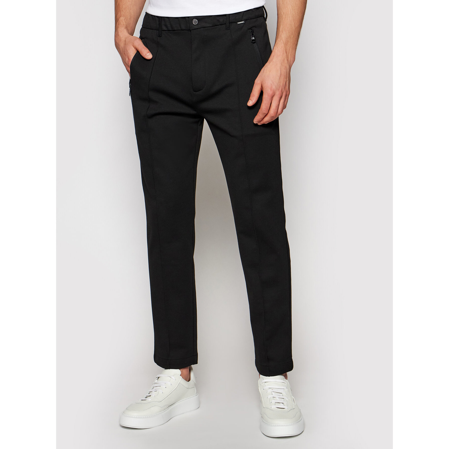 Calvin Klein Текстилни панталони K10K106550 Черен Tapered Fit - Pepit.bg