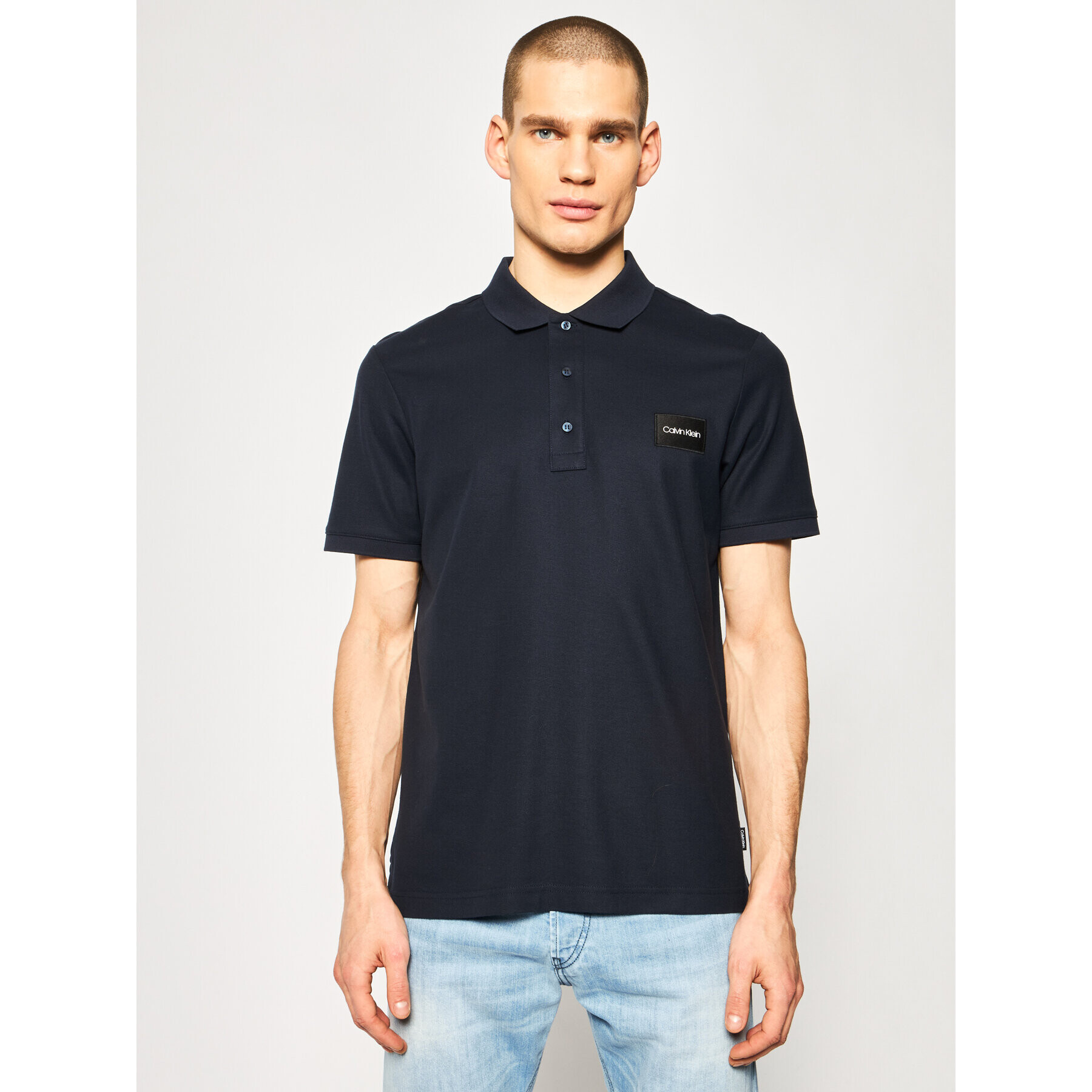 Calvin Klein Тениска с яка и копчета Refined Pique Logo Badge K10K105256 Тъмносин Regular Fit - Pepit.bg