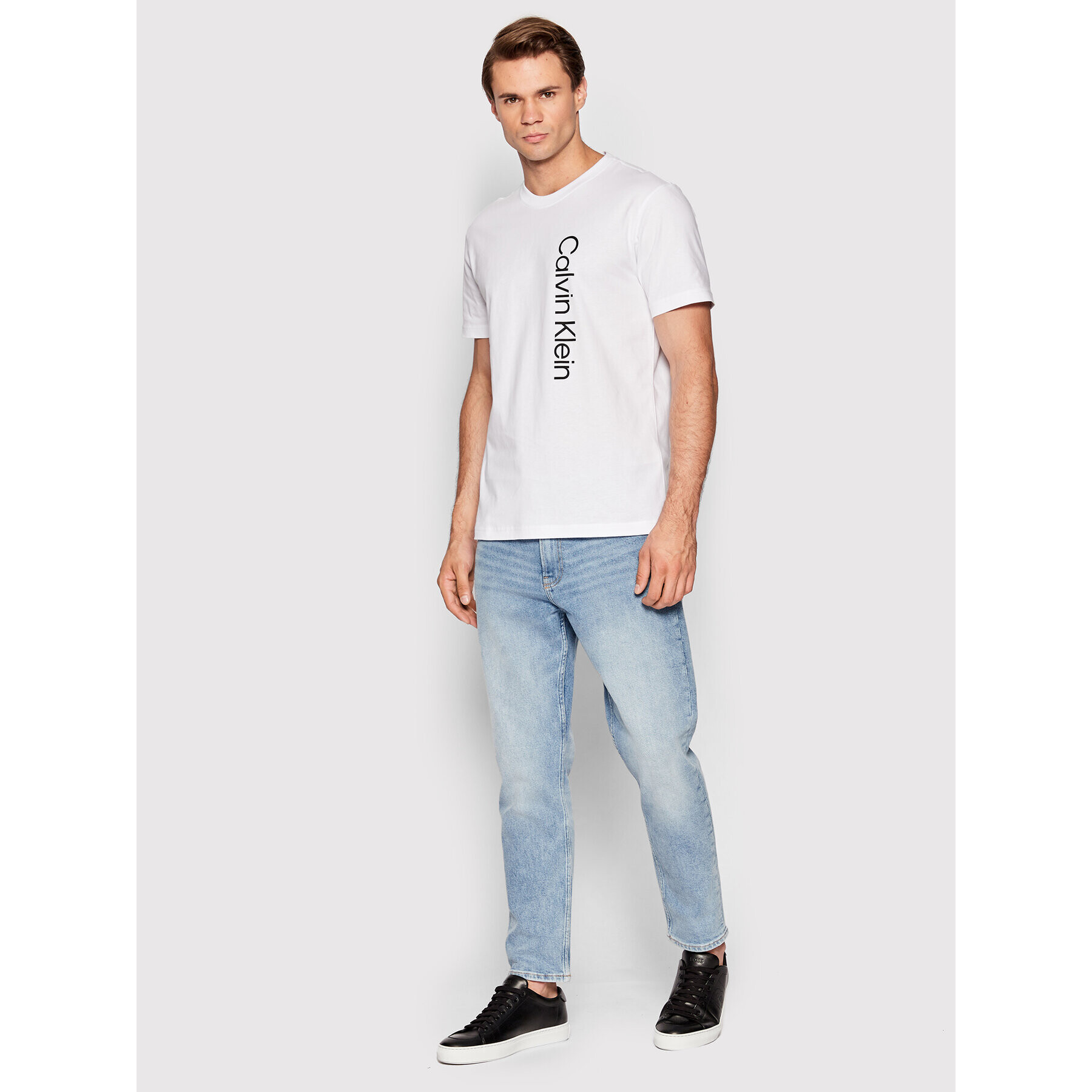 Calvin Klein Тишърт Off Placement Logo K10K109738 Бял Slim Fit - Pepit.bg