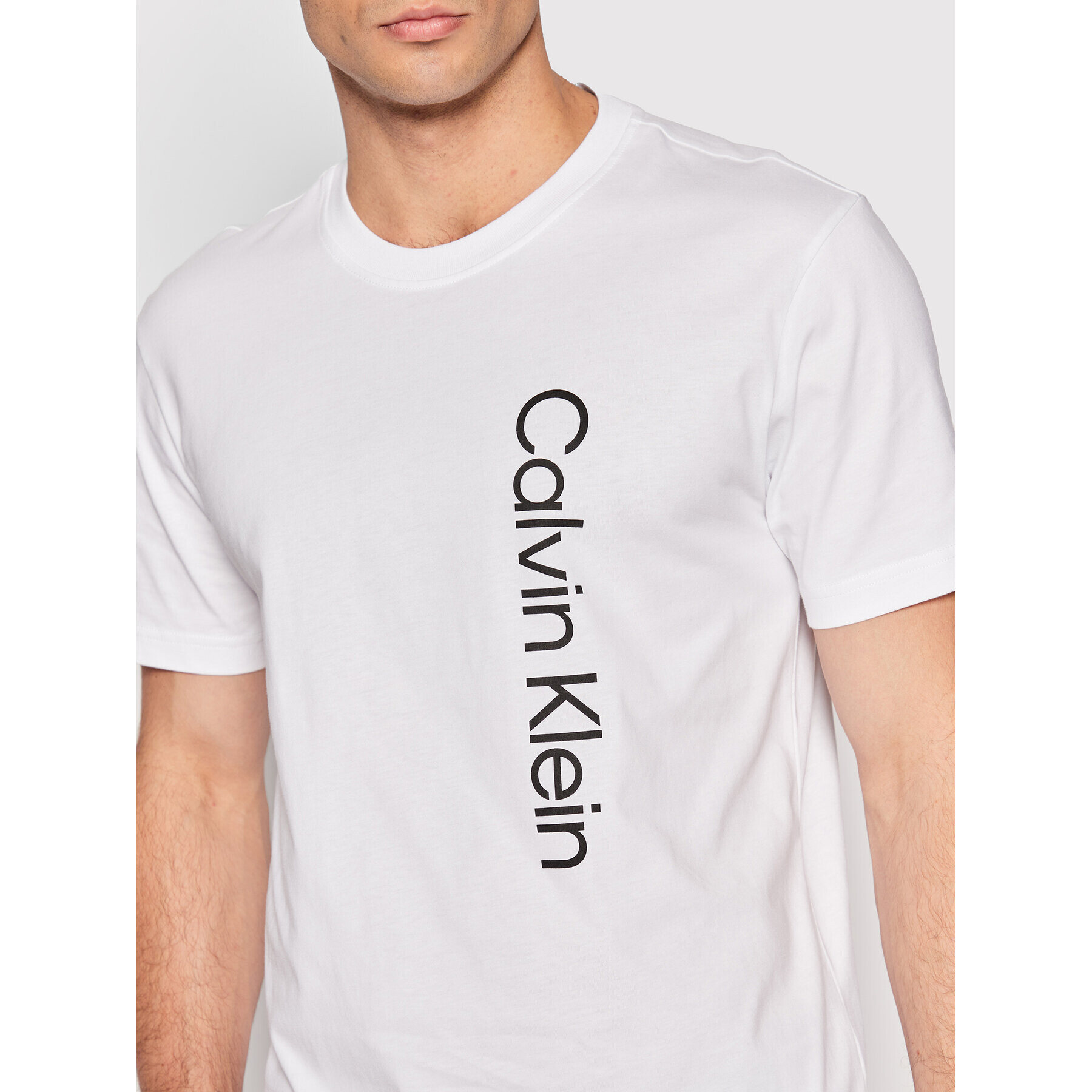 Calvin Klein Тишърт Off Placement Logo K10K109738 Бял Slim Fit - Pepit.bg