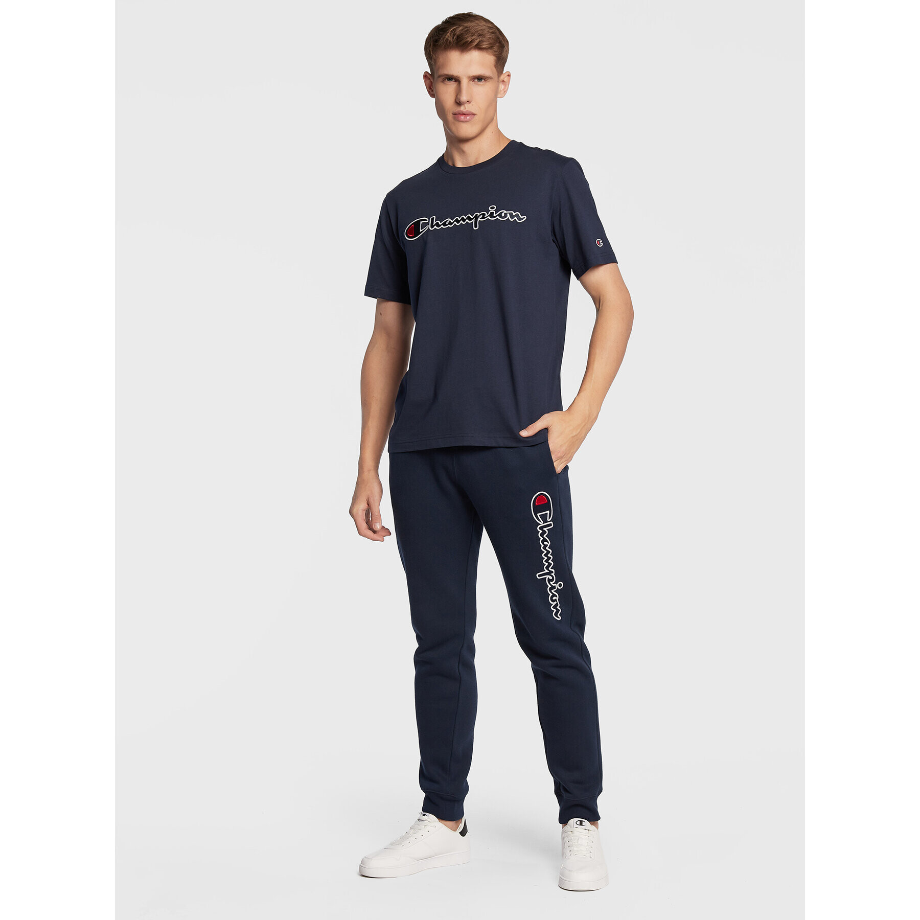 Champion Долнище анцуг 217860 Тъмносин Regular Fit - Pepit.bg