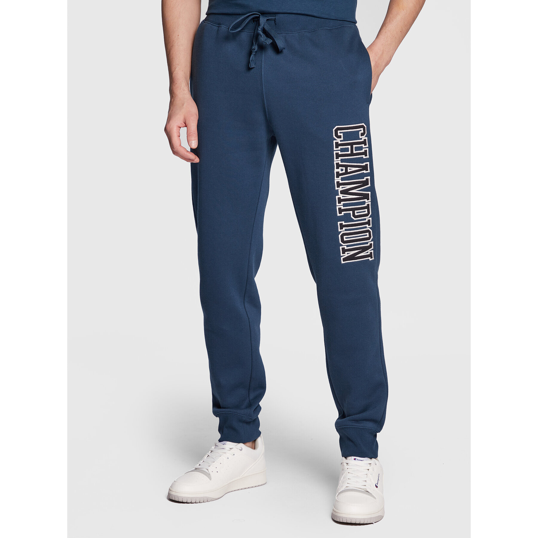 Champion Долнище анцуг Heavy Fleece Bookstore Logo 217880 Тъмносин Regular Fit - Pepit.bg