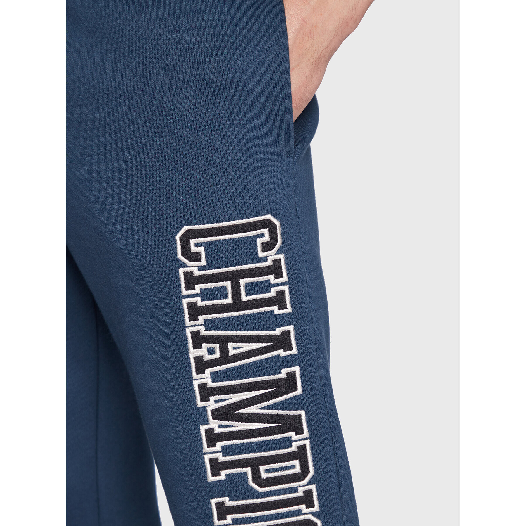 Champion Долнище анцуг Heavy Fleece Bookstore Logo 217880 Тъмносин Regular Fit - Pepit.bg