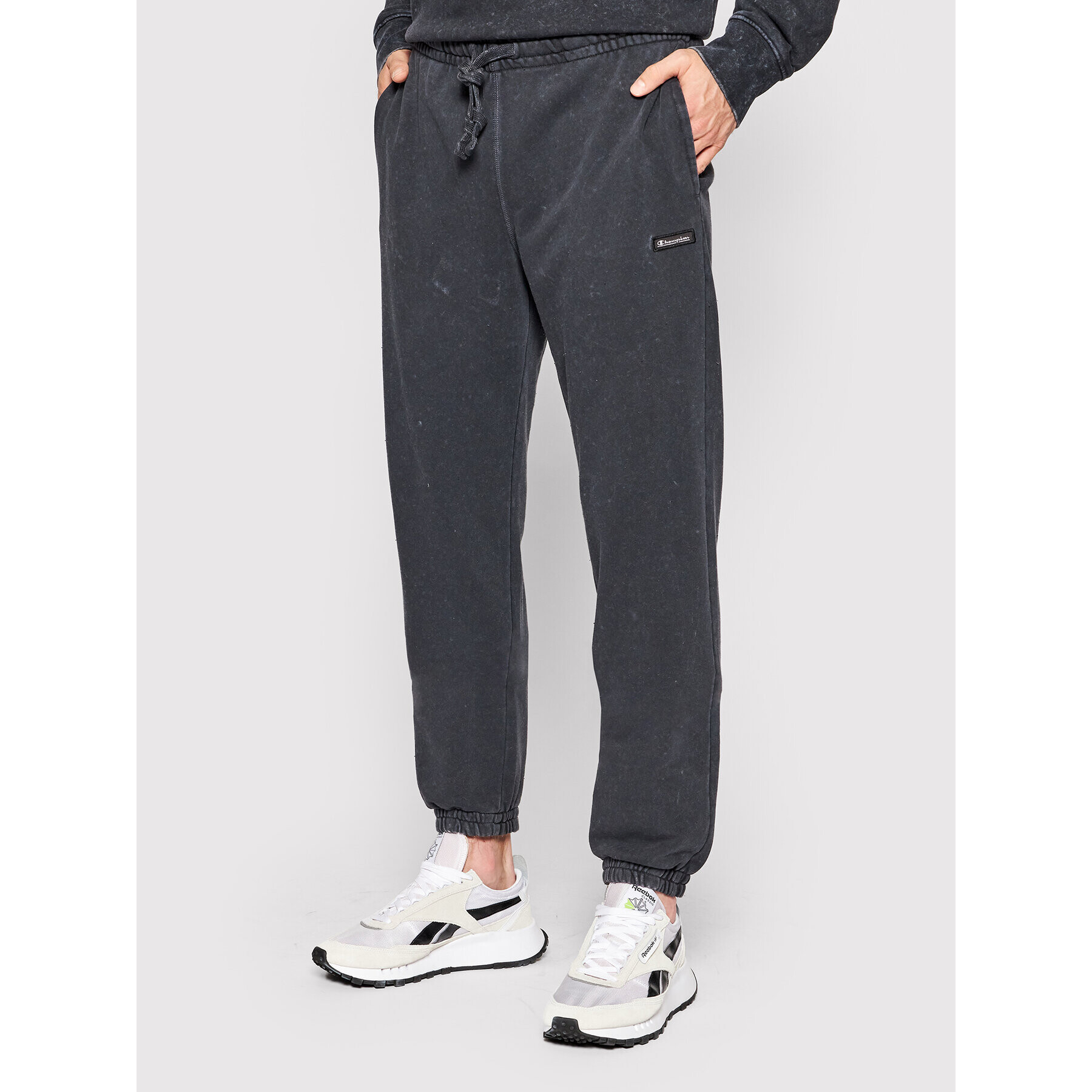 Champion Долнище анцуг Jacquard Label Marble Wash 217086 Черен Regular Fit - Pepit.bg
