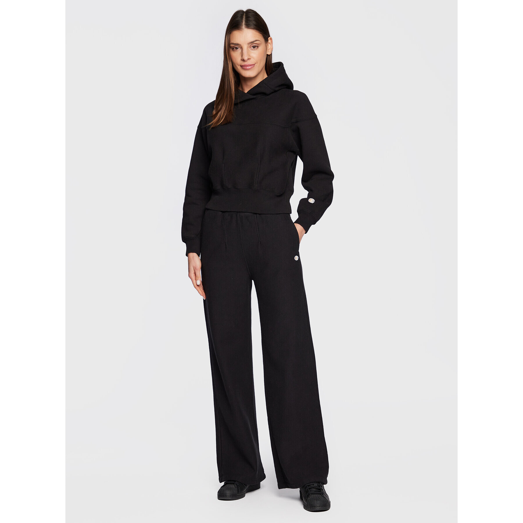 Champion Долнище анцуг Minimal 115648 Черен Regular Fit - Pepit.bg