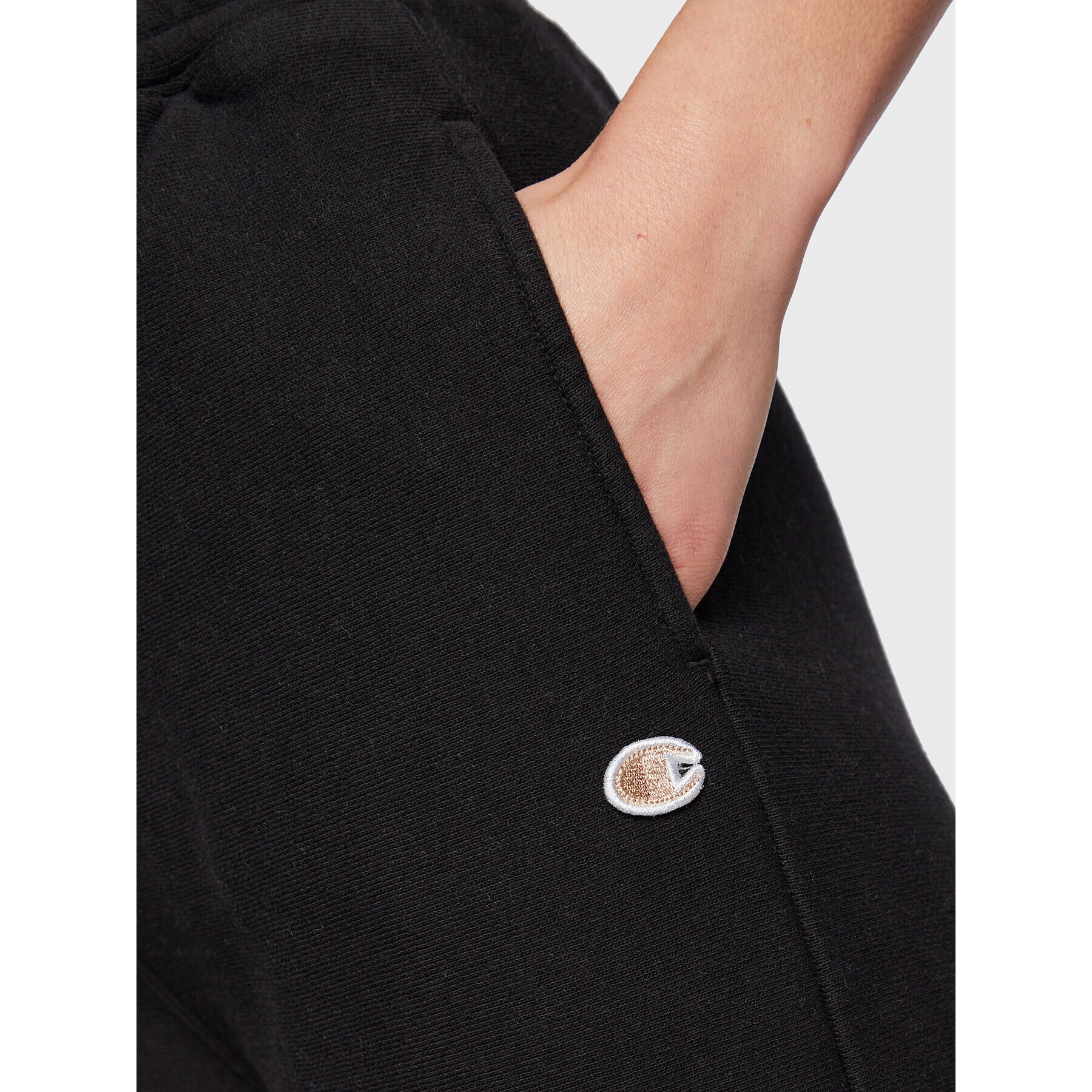 Champion Долнище анцуг Minimal 115648 Черен Regular Fit - Pepit.bg