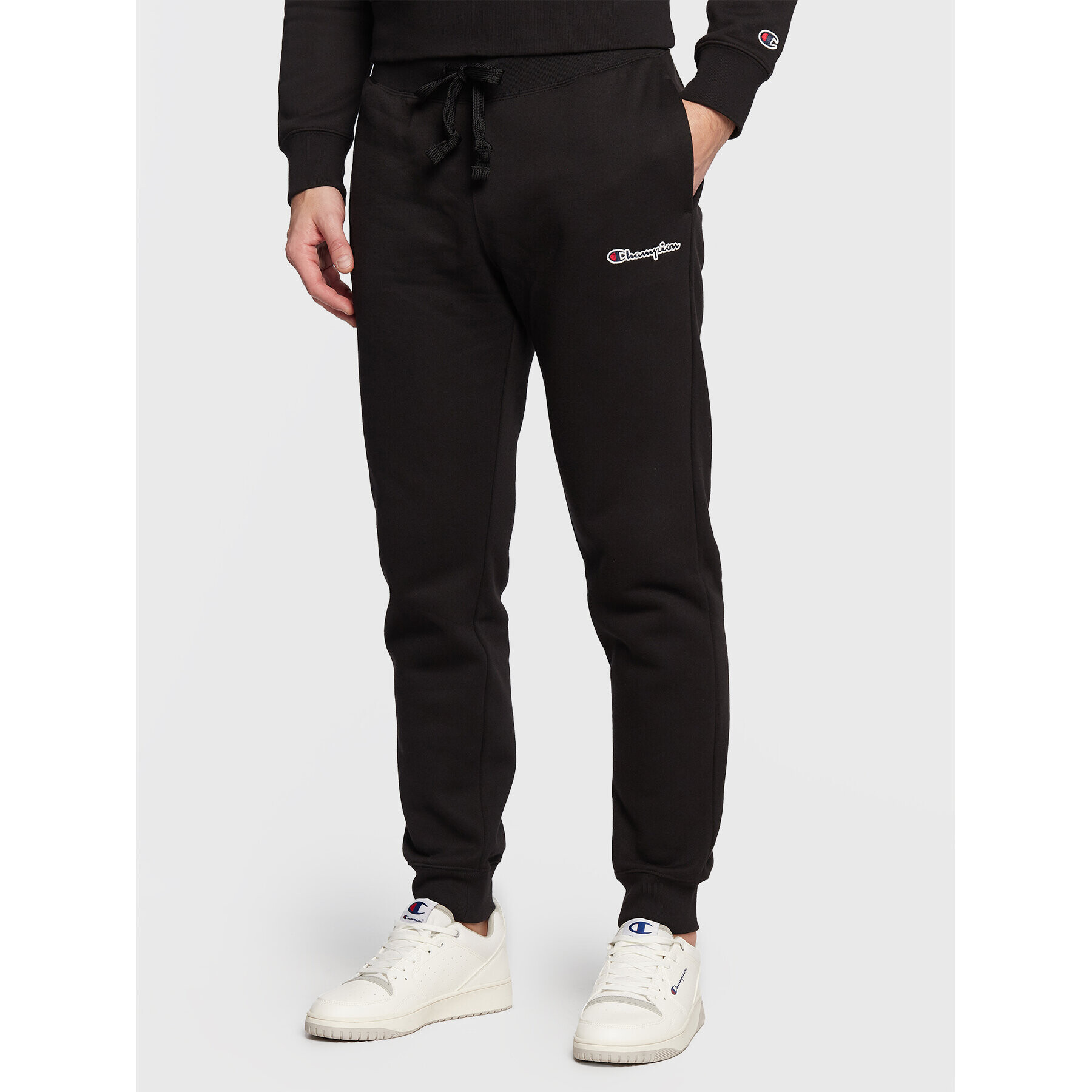 Champion Долнище анцуг Rib Cuff 217867 Черен Regular Fit - Pepit.bg