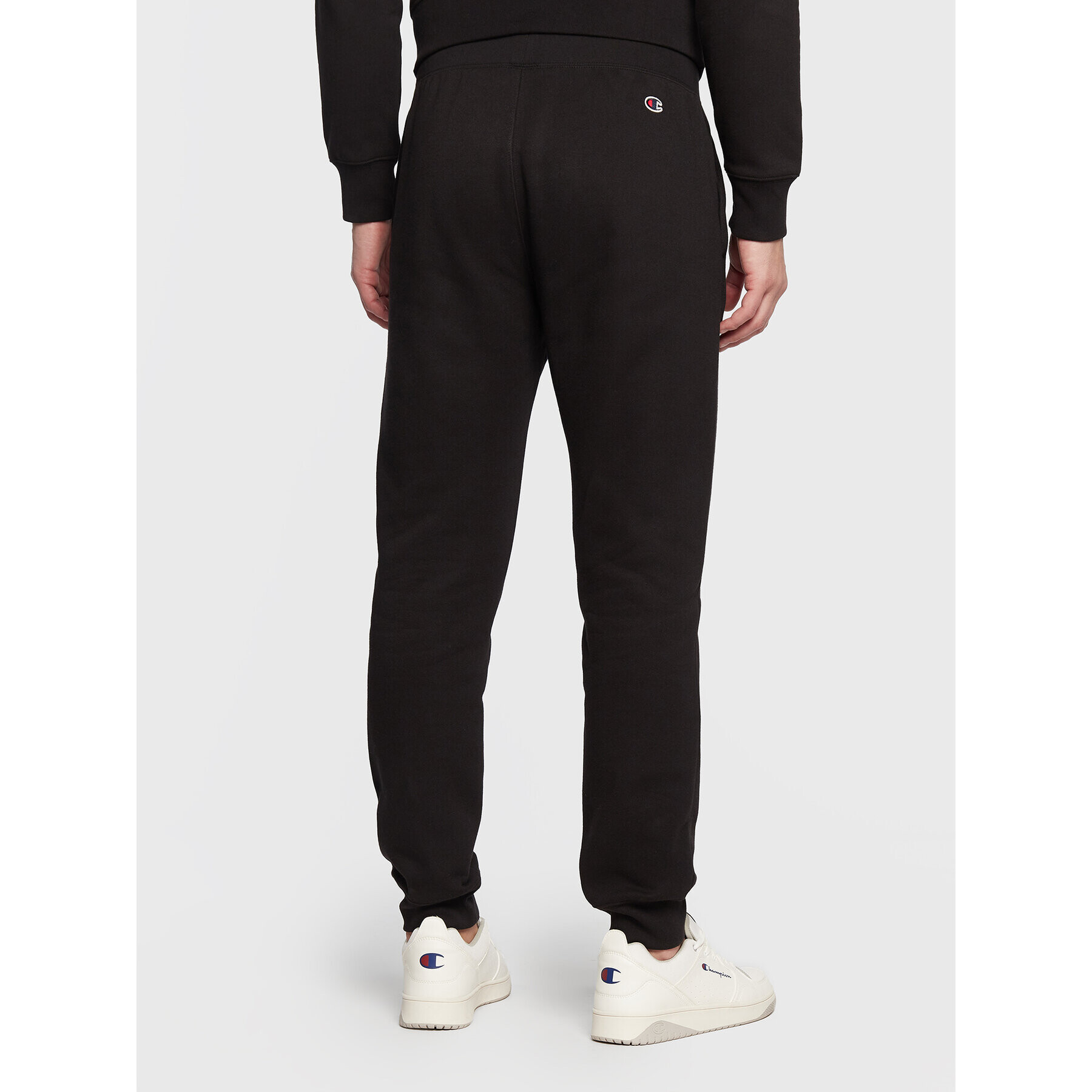 Champion Долнище анцуг Rib Cuff 217867 Черен Regular Fit - Pepit.bg