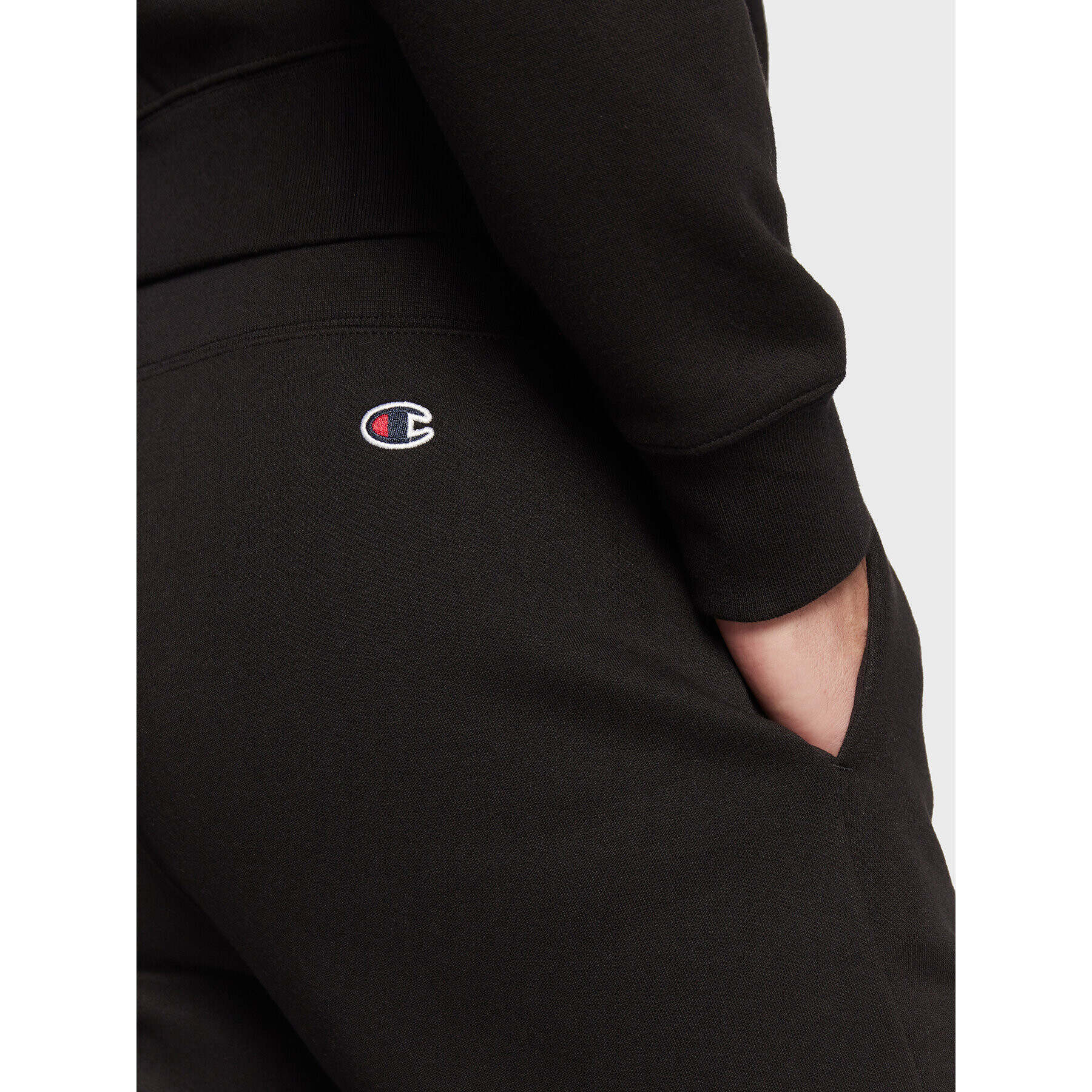 Champion Долнище анцуг Rib Cuff 217867 Черен Regular Fit - Pepit.bg