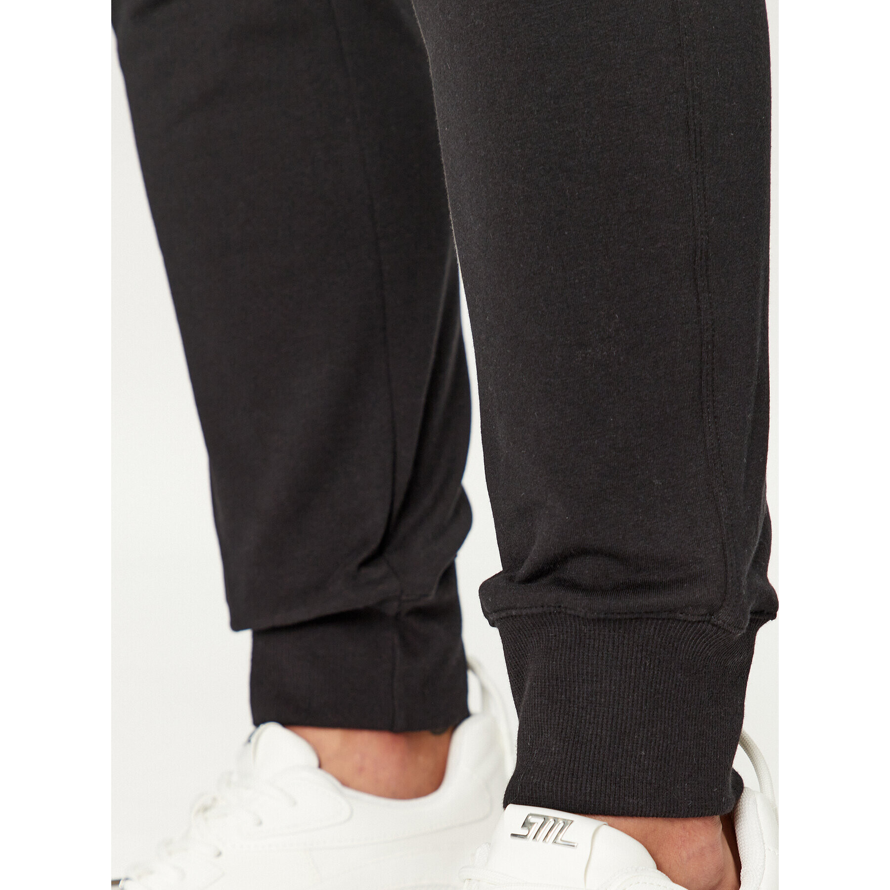 Champion Долнище анцуг Rib Cuff Pants 116605 Черен Regular Fit - Pepit.bg