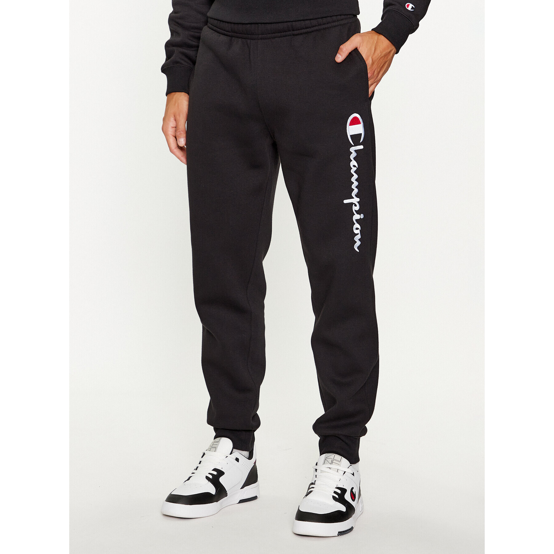 Champion Долнище анцуг Rib Cuff Pants 219418 Черен Comfort Fit - Pepit.bg