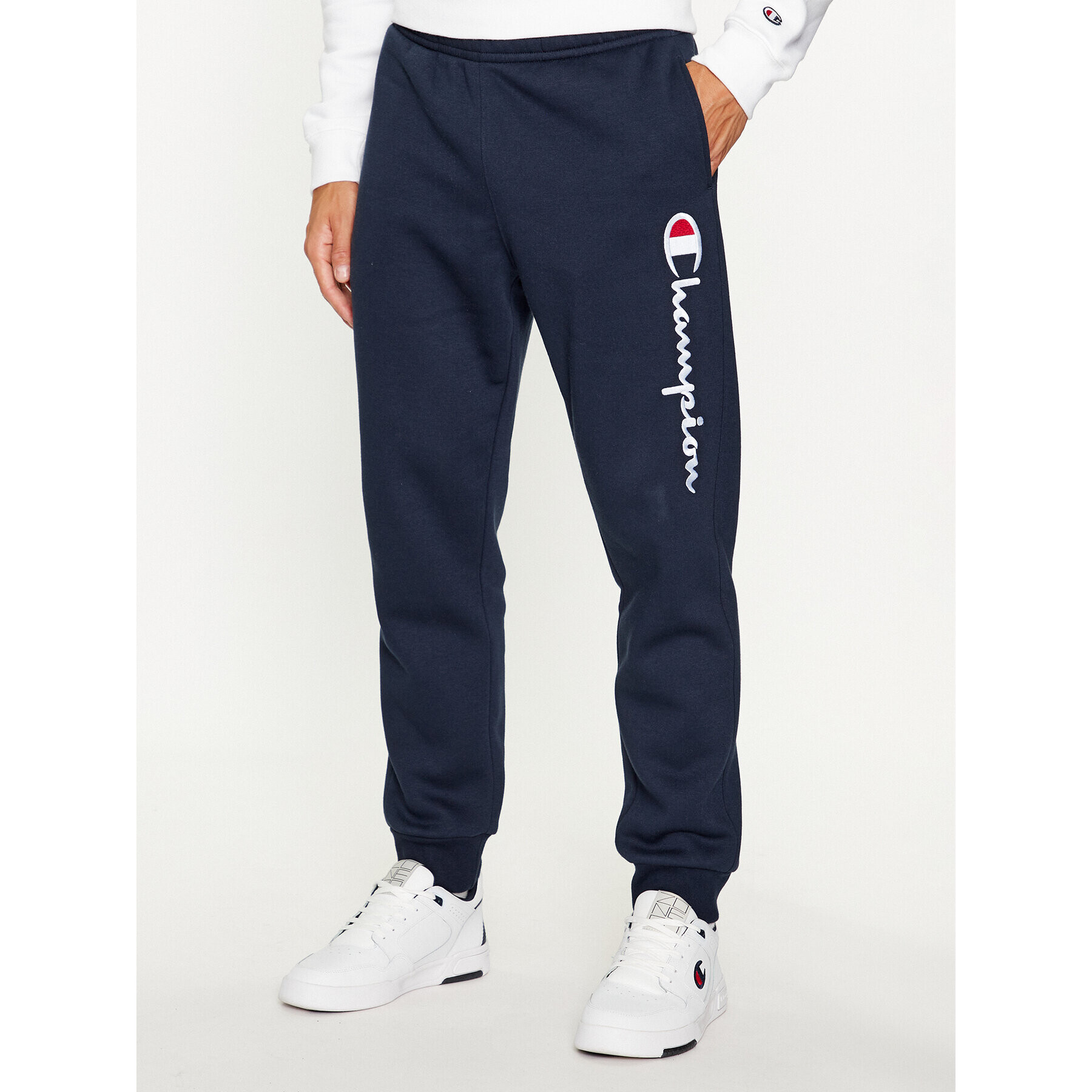 Champion Долнище анцуг Rib Cuff Pants 219418 Тъмносин Comfort Fit - Pepit.bg