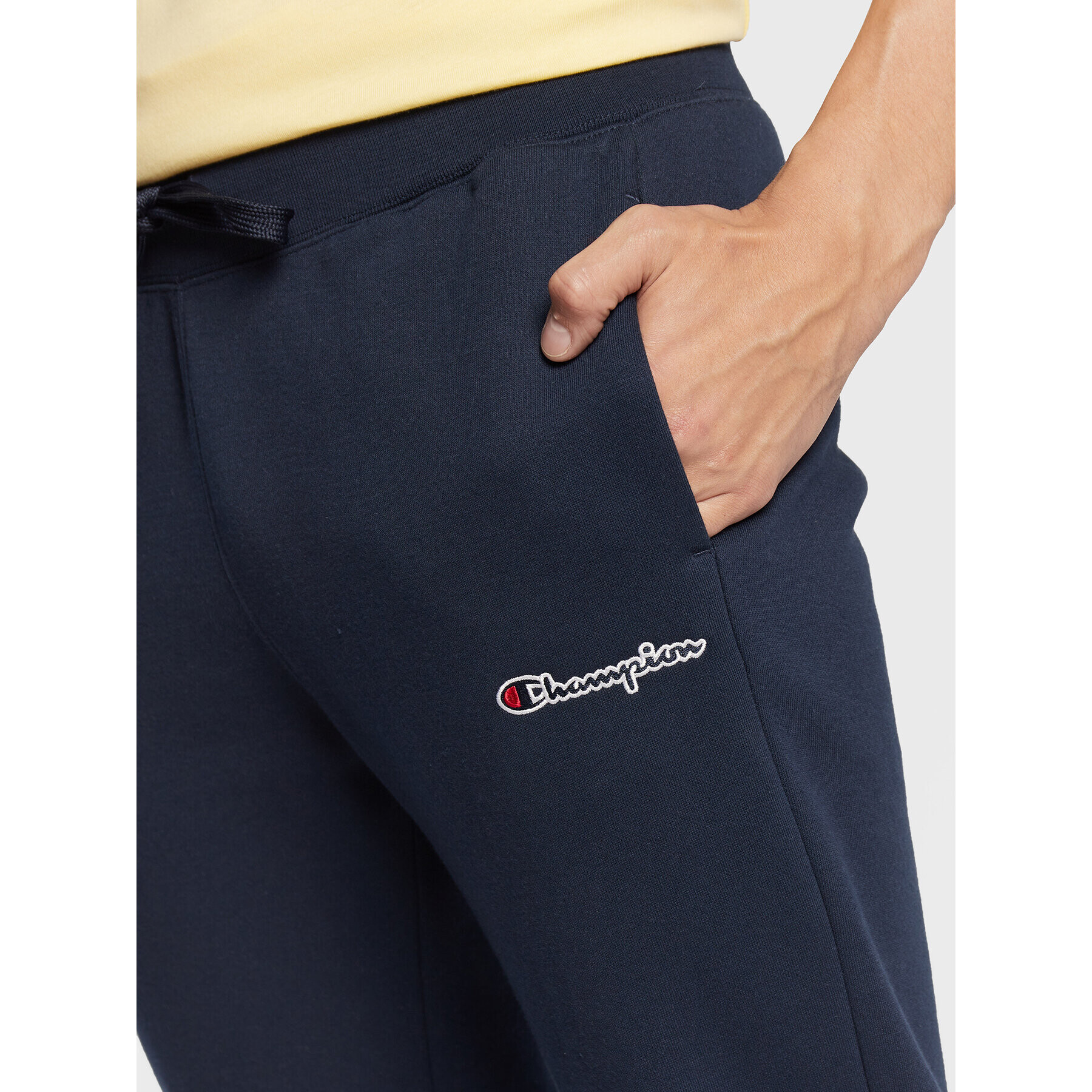 Champion Долнище анцуг Small Script Logo 217867 Тъмносин Regular Fit - Pepit.bg