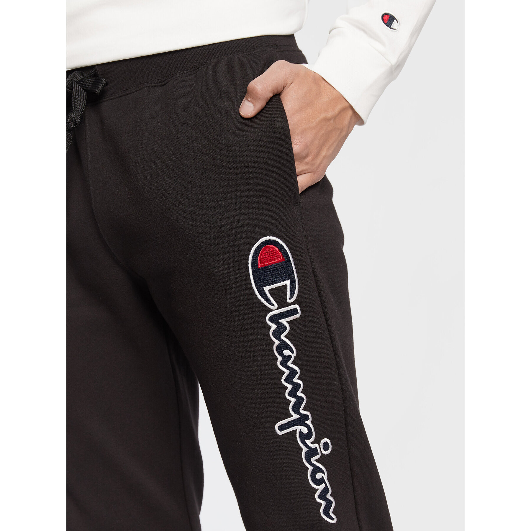 Champion Долнище анцуг Vertical Logo Embroidery 217860 Черен Regular Fit - Pepit.bg