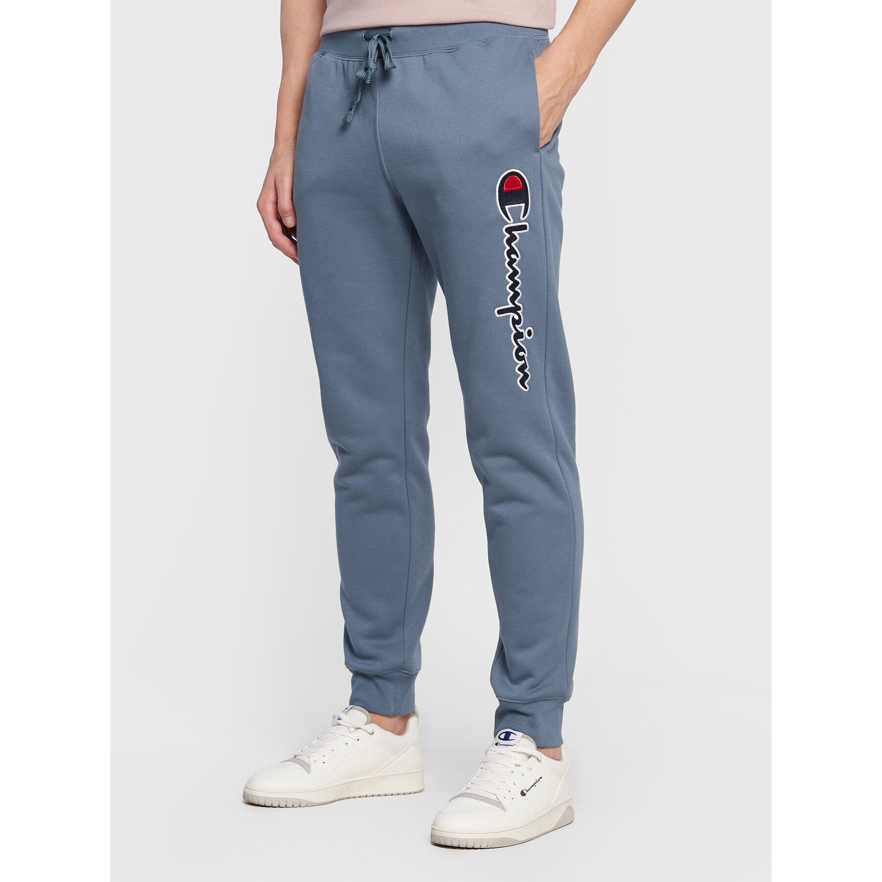 Champion Долнище анцуг Vertical Logo Embroidery 217860 Син Regular Fit - Pepit.bg