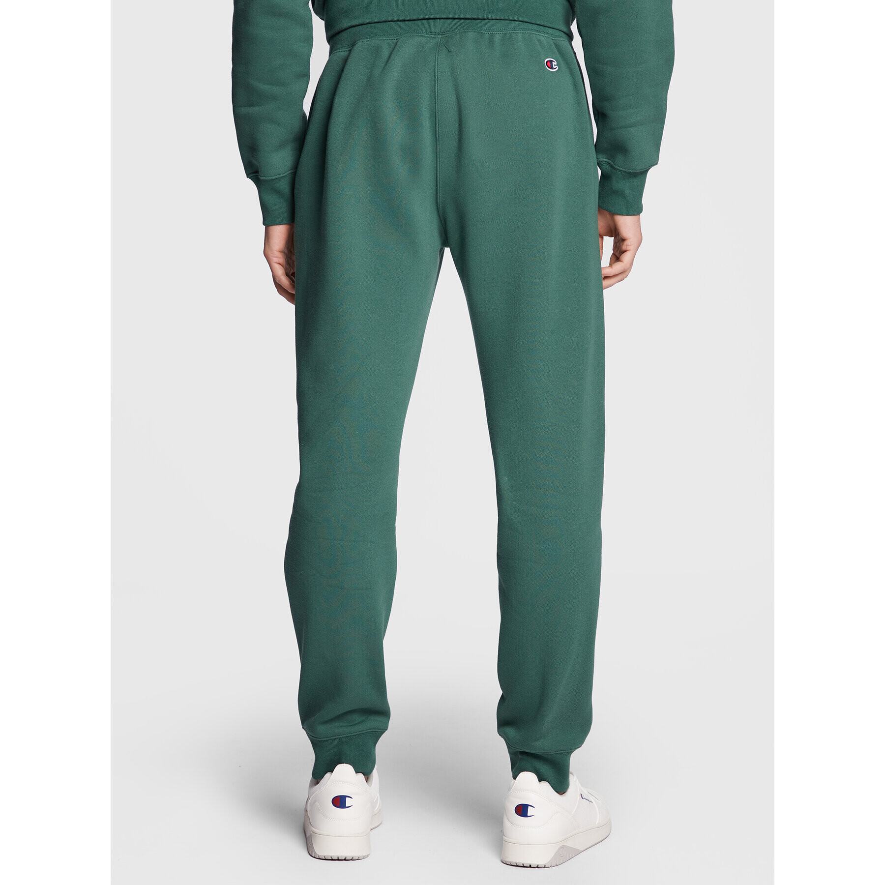 Champion Долнище анцуг Vertical Logo Embroidery 217860 Зелен Regular Fit - Pepit.bg
