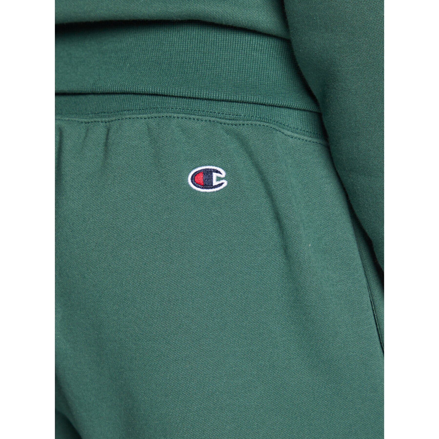 Champion Долнище анцуг Vertical Logo Embroidery 217860 Зелен Regular Fit - Pepit.bg