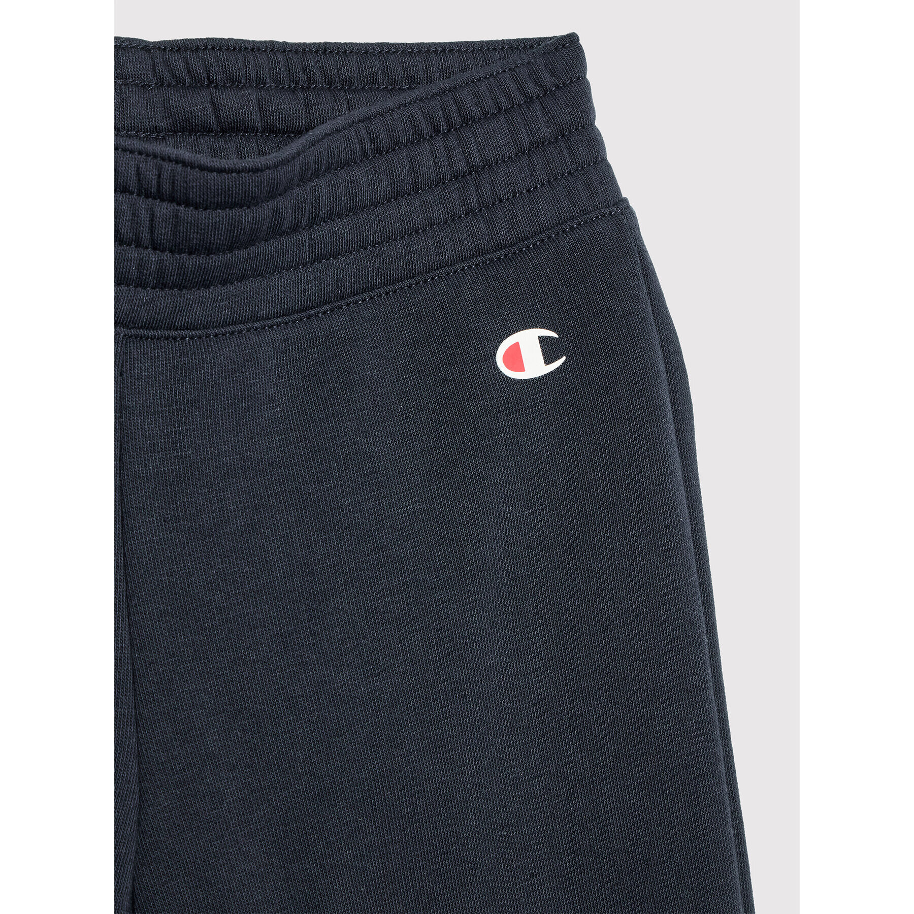 Champion Долнище анцуг 404302 Тъмносин Regular Fit - Pepit.bg