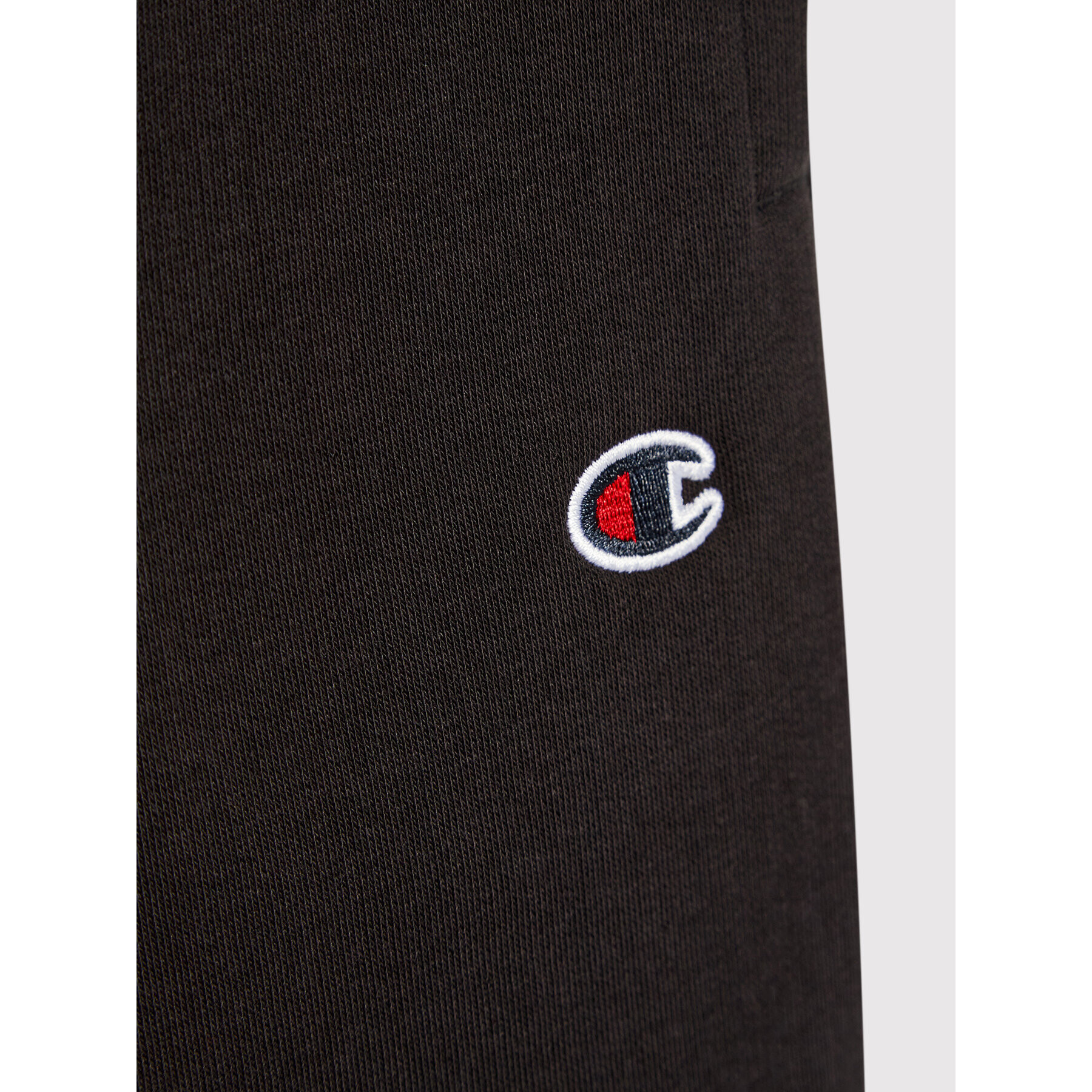Champion Долнище анцуг Asymmetric Colour Block 305782 Черен Regular Fit - Pepit.bg
