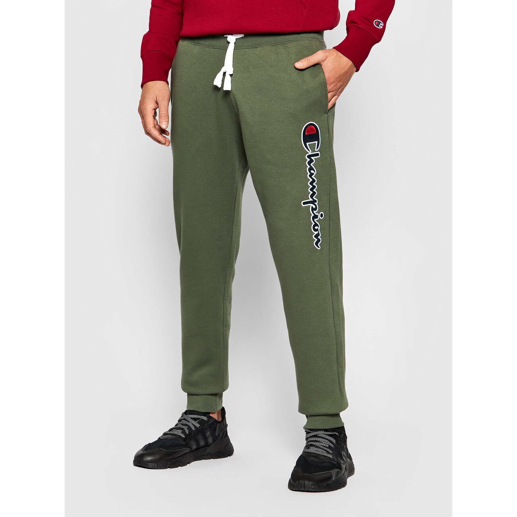 Champion Долнище анцуг Blend Vertical Script Logo 216472 Зелен Regular Fit - Pepit.bg