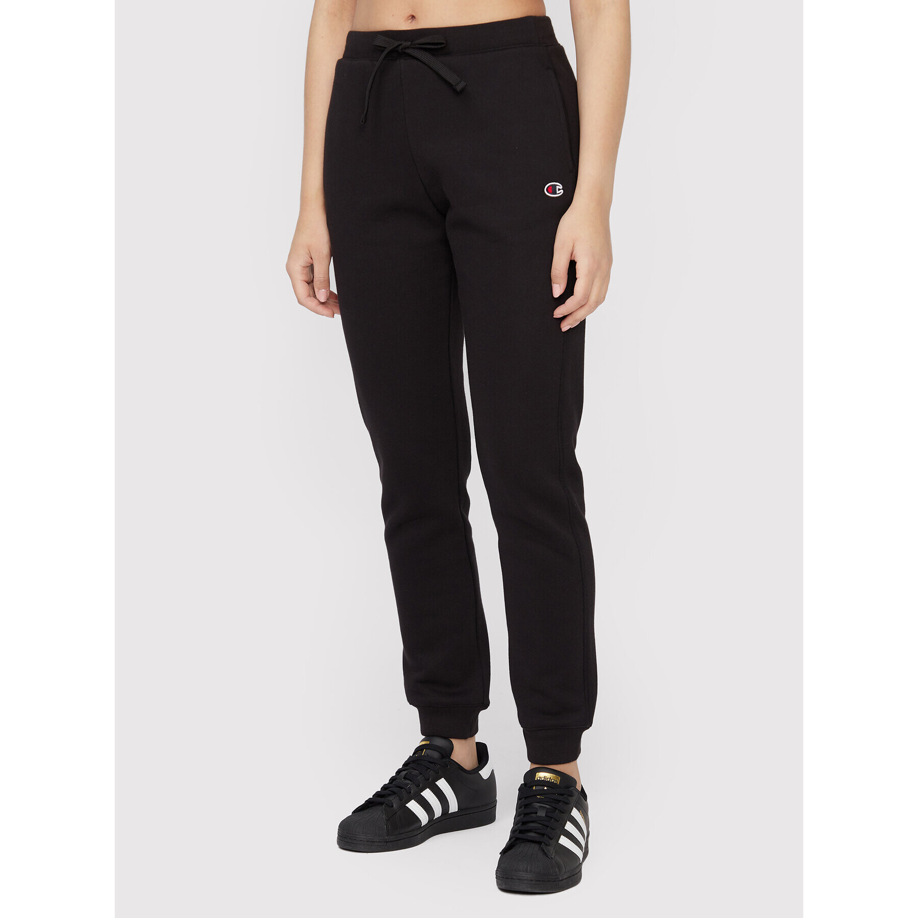 Champion Долнище анцуг Logo 115486 Черен Regular Fit - Pepit.bg