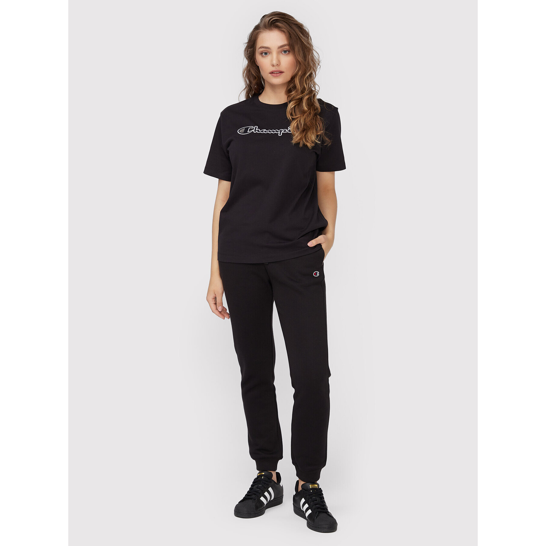 Champion Долнище анцуг Logo 115486 Черен Regular Fit - Pepit.bg