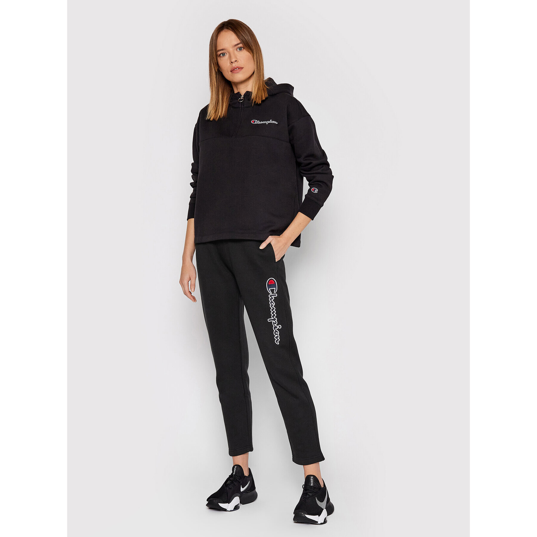 Champion Долнище анцуг Script Logo 114471 Черен Regular Fit - Pepit.bg