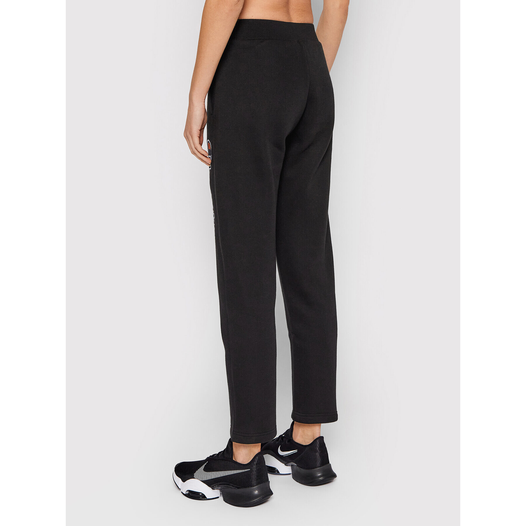 Champion Долнище анцуг Script Logo 114471 Черен Regular Fit - Pepit.bg